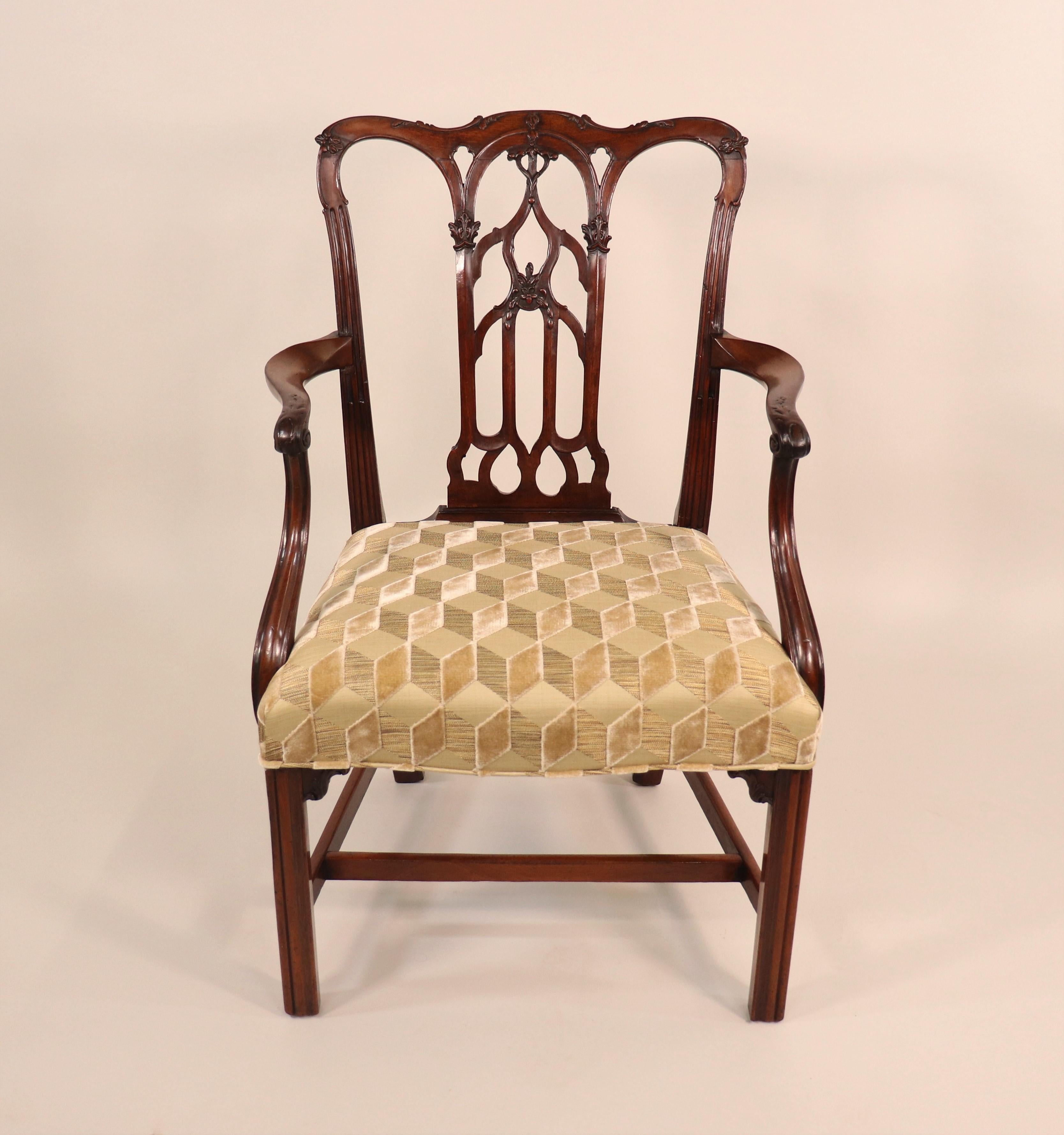 Circa 1750 English Georgian II period mahogany armchair. The George II period was most noted for its intricate chairs. Like the other Georgian periods, this one was named after the monarch during the time. Under George II, mahogany became the
