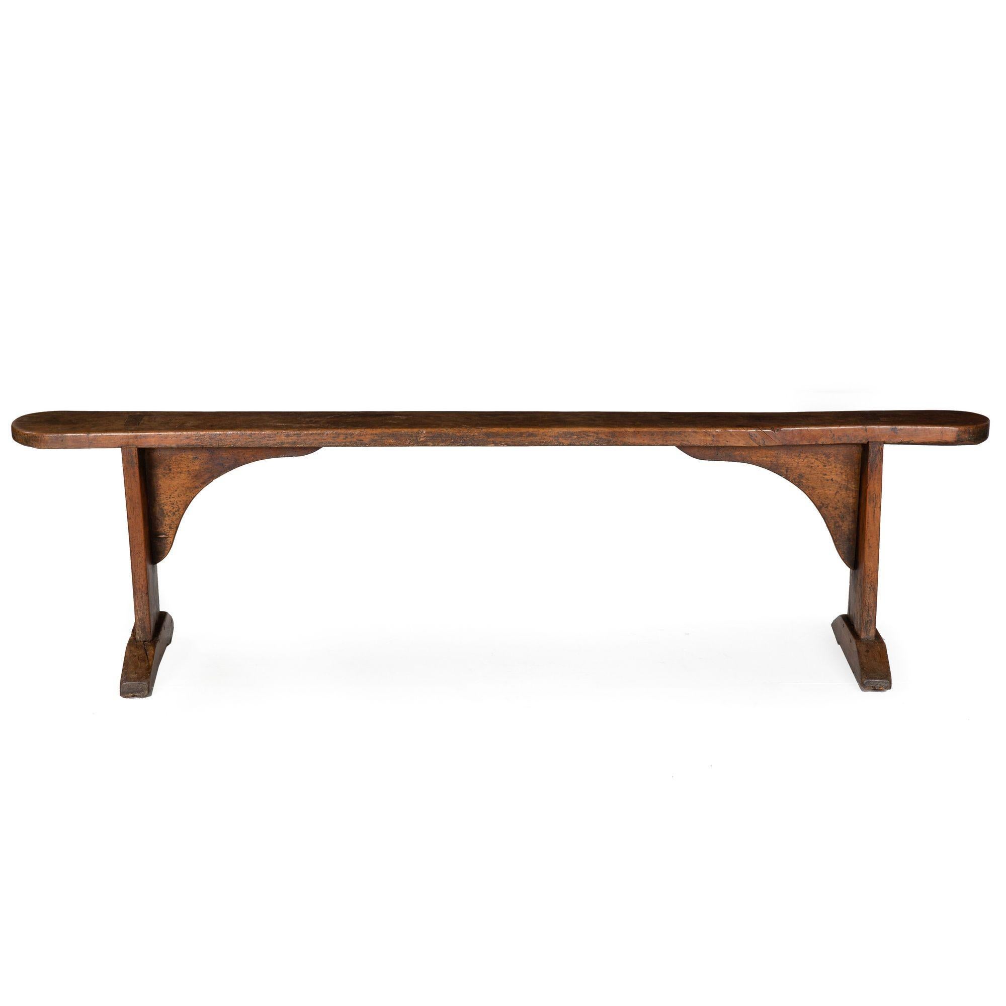 ENGLISH PATINATED ELM LONG TRESTLE BENCH
Two available  Circa 1750 with restorations
Item # 305TBP10L-2

An incredibly beautiful bench, we acquired this as part of a pair (the other possibly still available in our inventory under item # 305TBP10L-1)