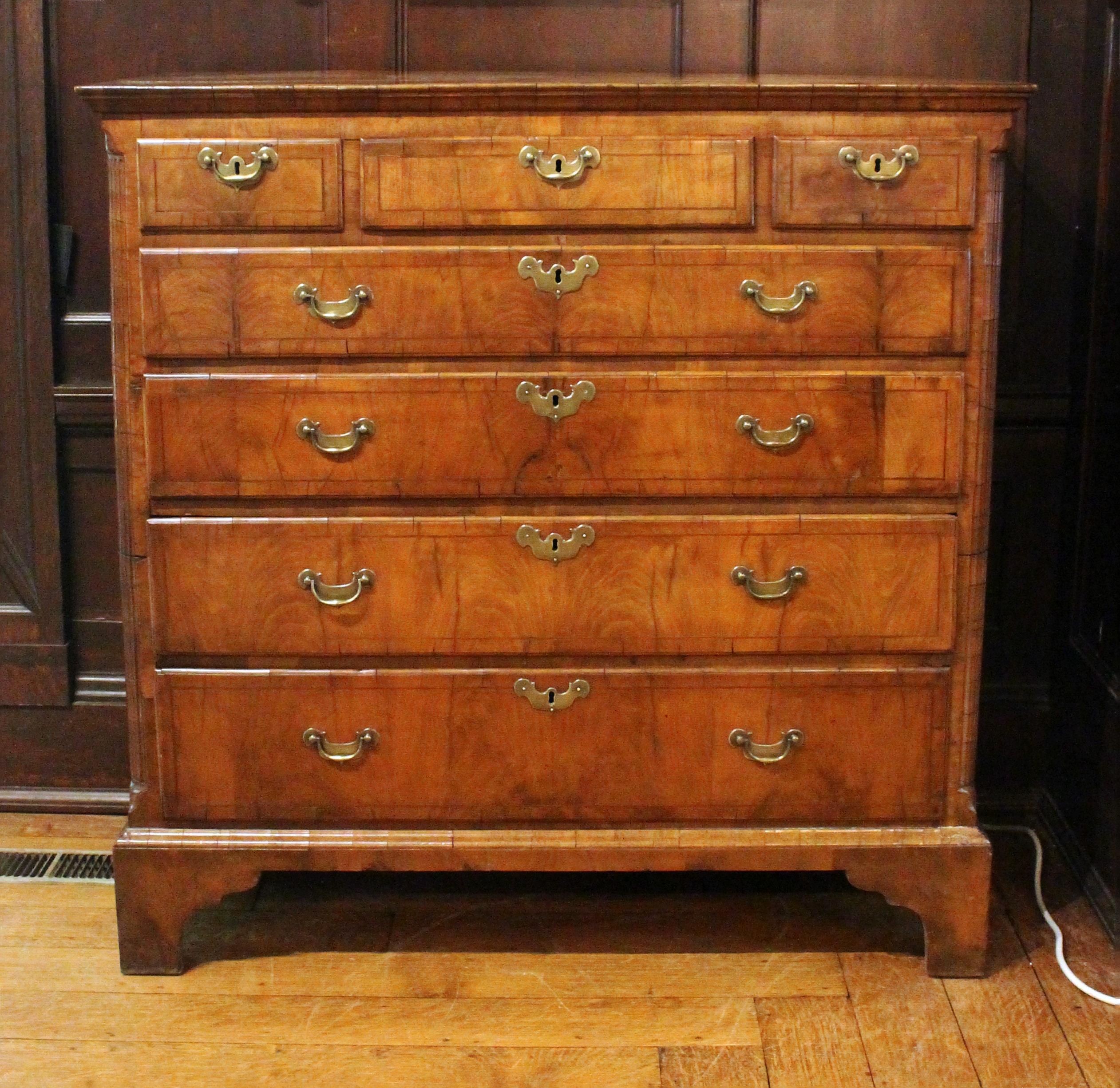 Circa 1750 town house chest of drawers, English. Superb quality, George II period, walnut veneer. Called a town house chest for its 2-part construction allowing it up narrow staircases. Canted, fluted quarter columns. Original bracket feet. Later,