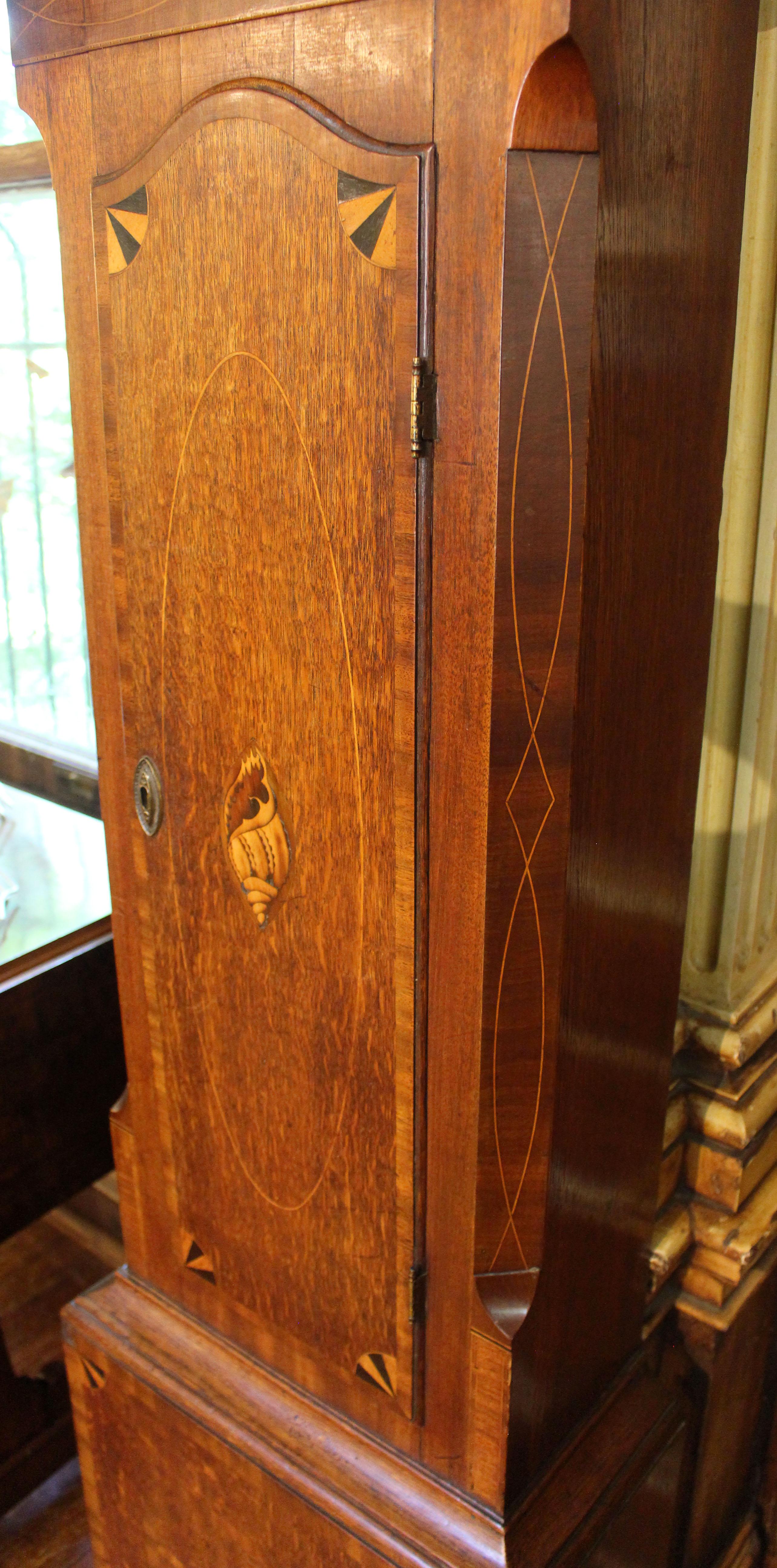 Circa 1770s George III period tall case clock, English, by James Woolley. Oak & mahogany. Works signed 