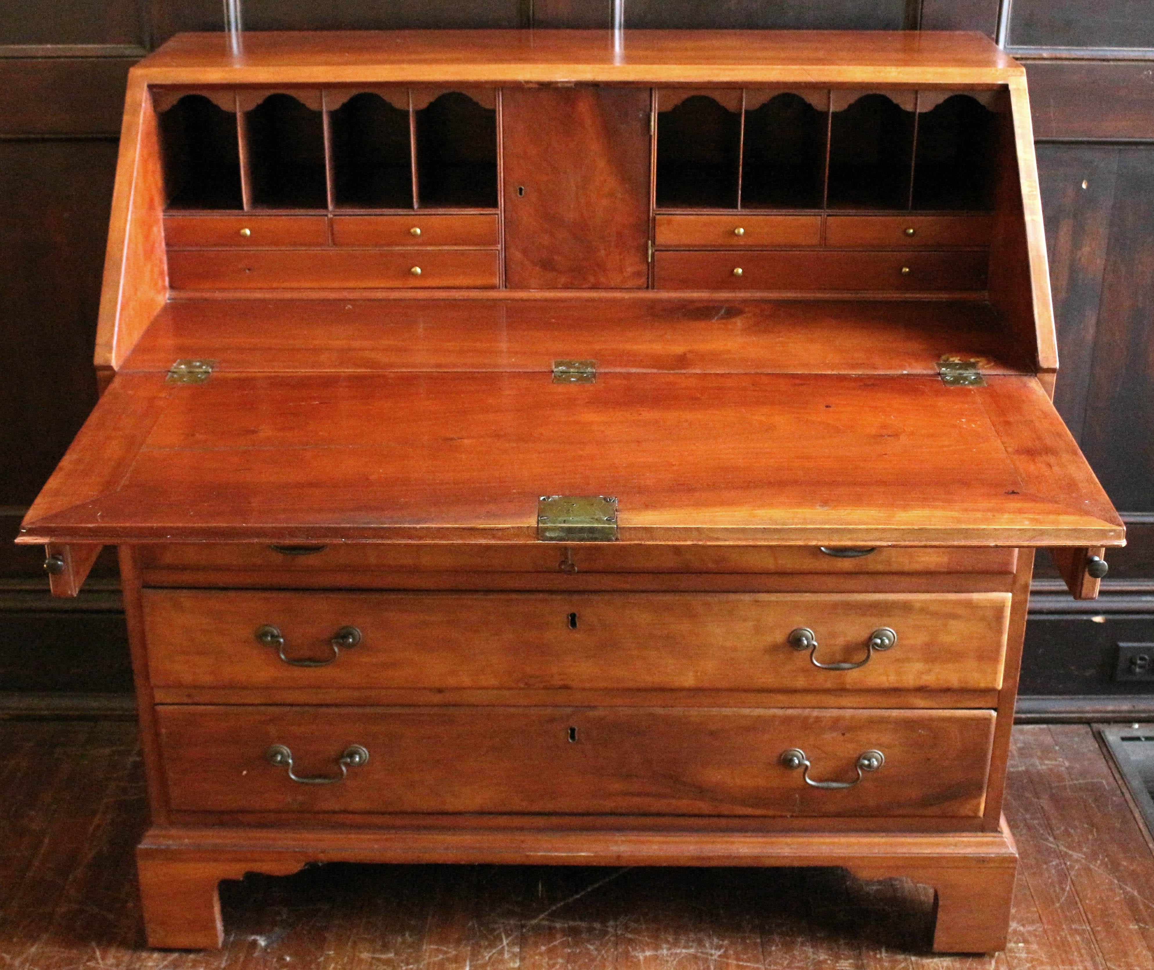 Circa 1780-1810 American slant-front desk of well figured solid flame birch, cherry, and birch. Classic mix of woods. Yellow pine secondary wood, typical of the upper South (Kentucky). Well fitted interior of valanced pigeon holes & drawers with