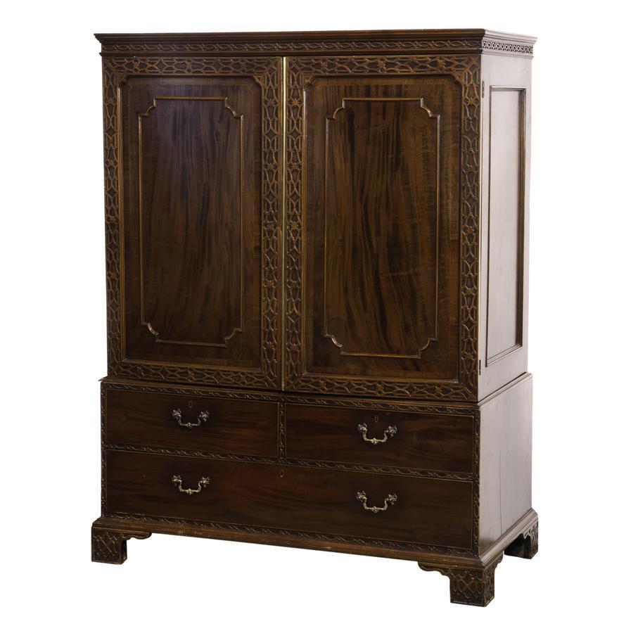 Hand-Crafted Circa 1790 English George III Carved Mahogany Chinese Chippendale Linen Press For Sale
