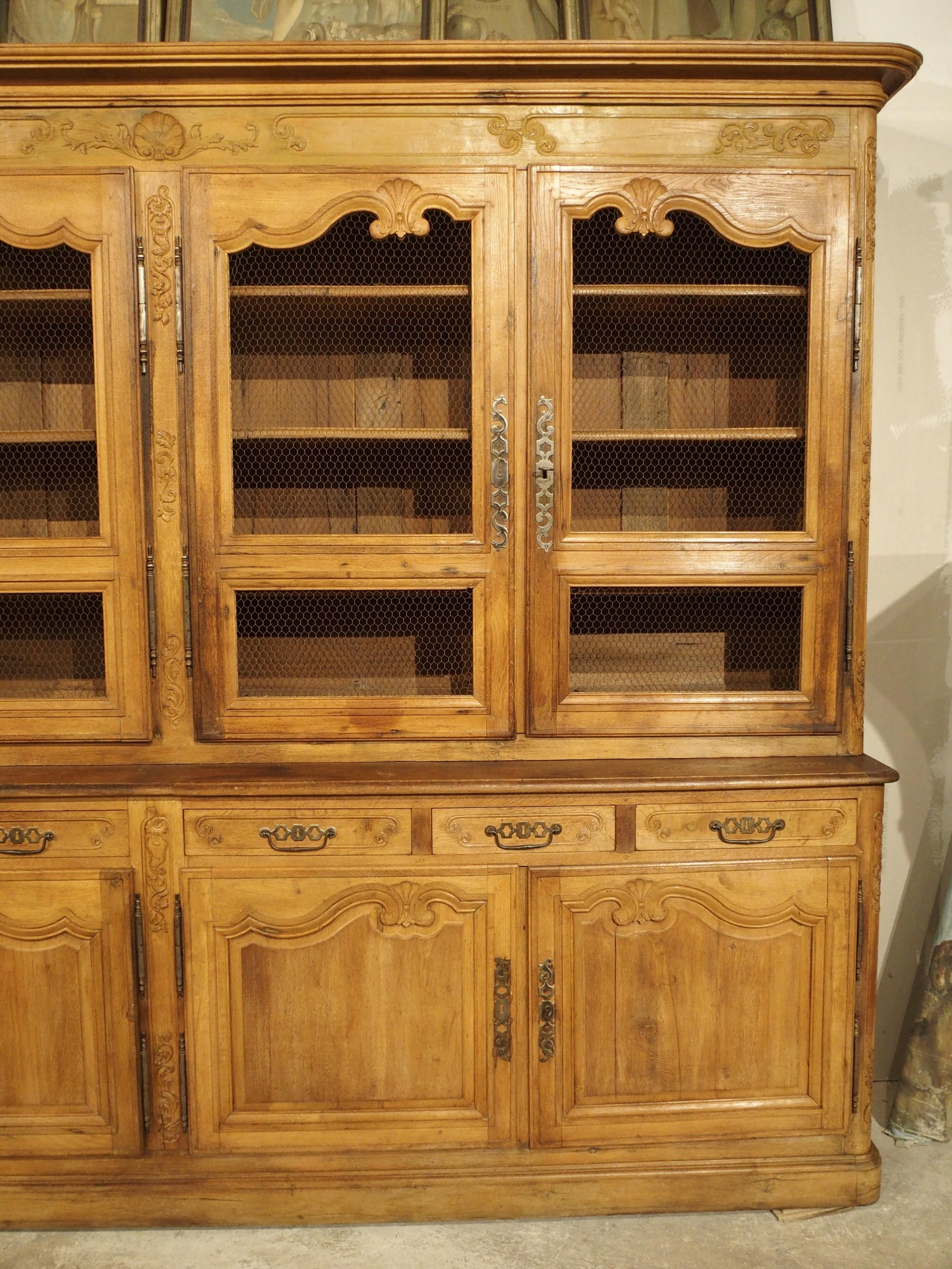 French Circa 1800 Carved Oak and Wire Paneled Double Bibliothèque from Southwest France For Sale