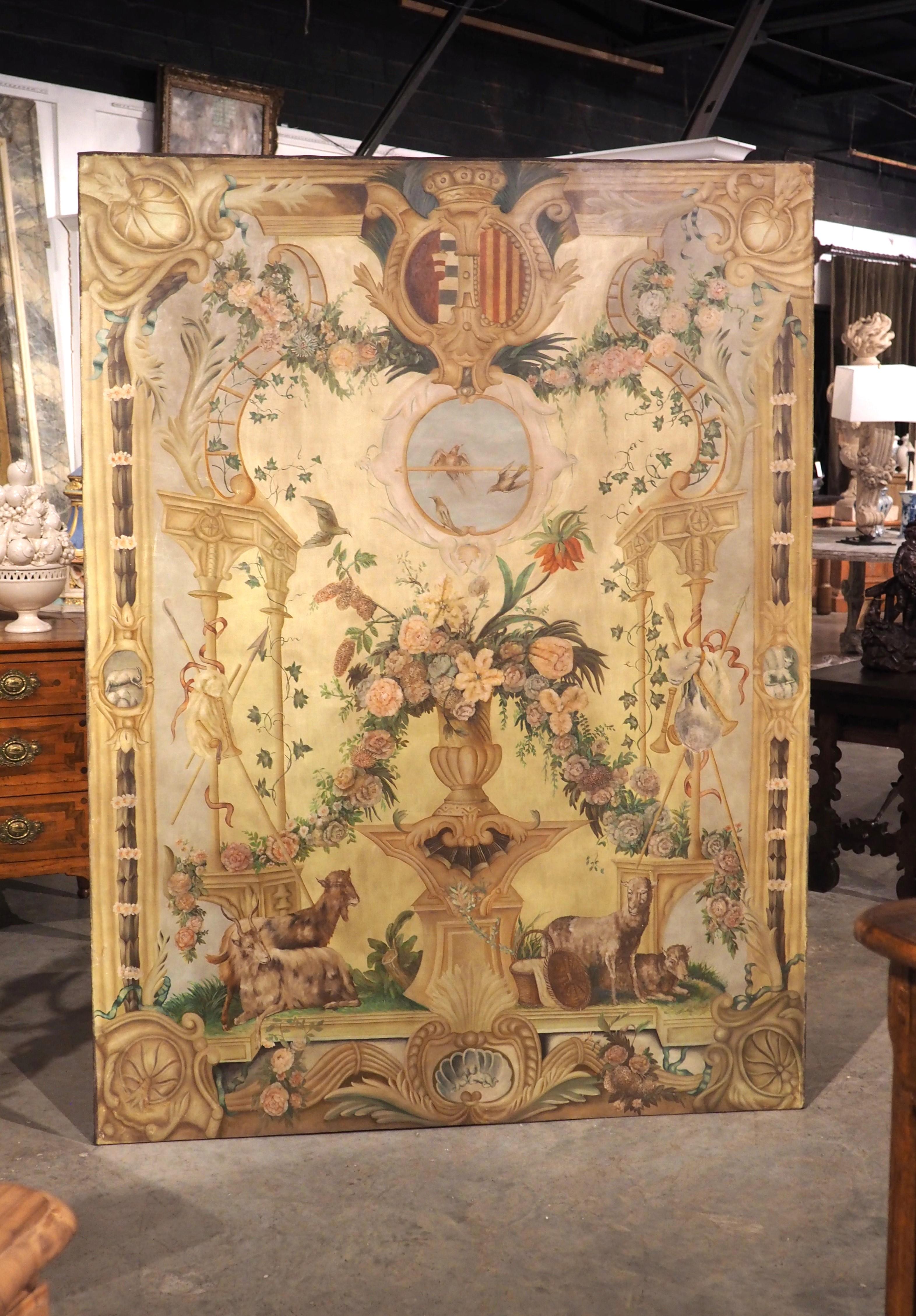 Recently purchased from a home in Perpignan, France, this toile peinte with a double coat of arms is not only a beautiful painting representing the arrival of Spring, but also a piece of history involving French royalty. Painted by an unknown French