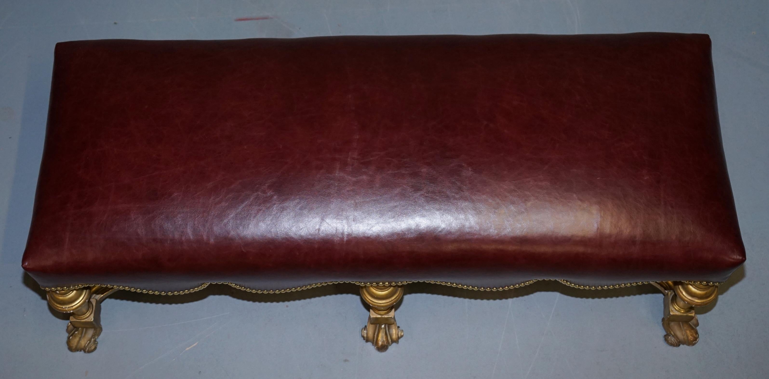 Early 19th Century Italian Baroque Style Gold Giltwood Bench Stool New Oxblood Leather, circa 1800 For Sale