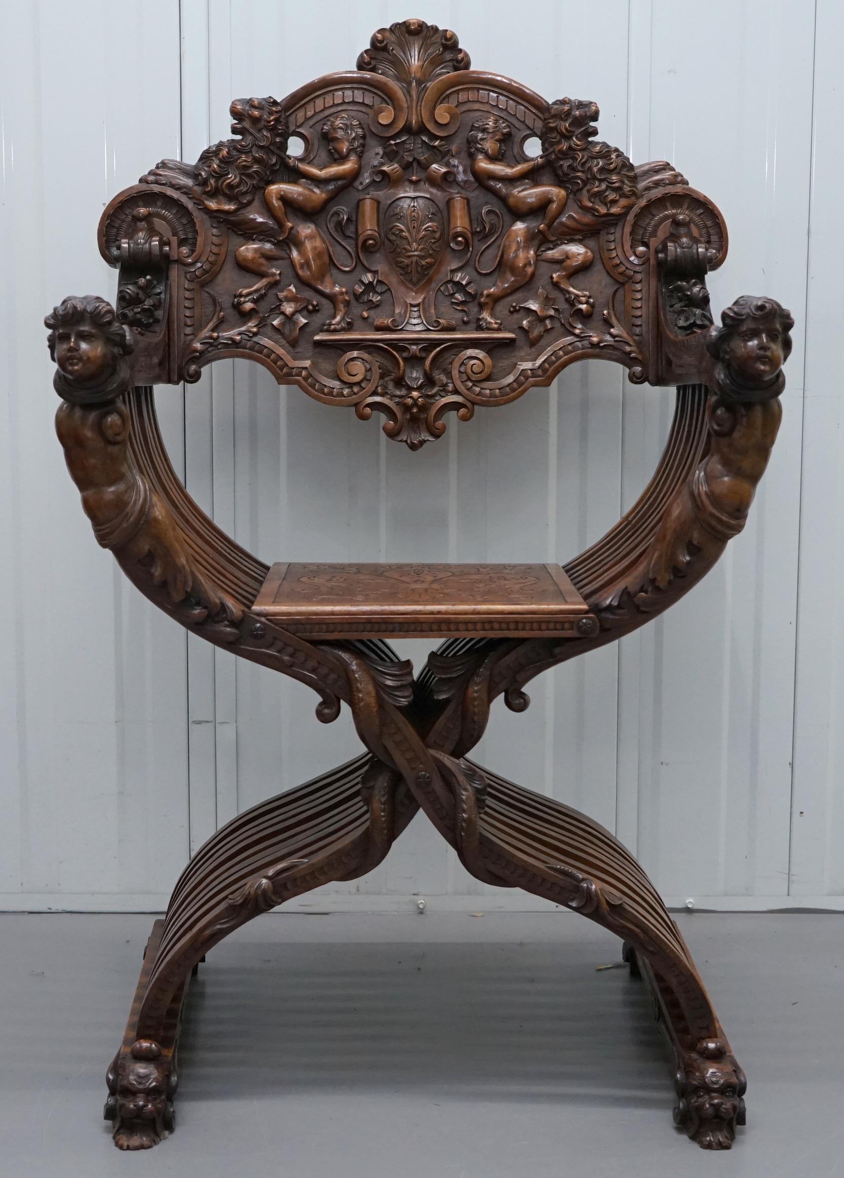 We are delighted to offer for sale this absolutely stunning heavily carved circa 1800 Savonarola armchair in solid walnut

This is one of the most decorative and heavily carved with extreme detail armchairs I have ever seen, you have Lion riding