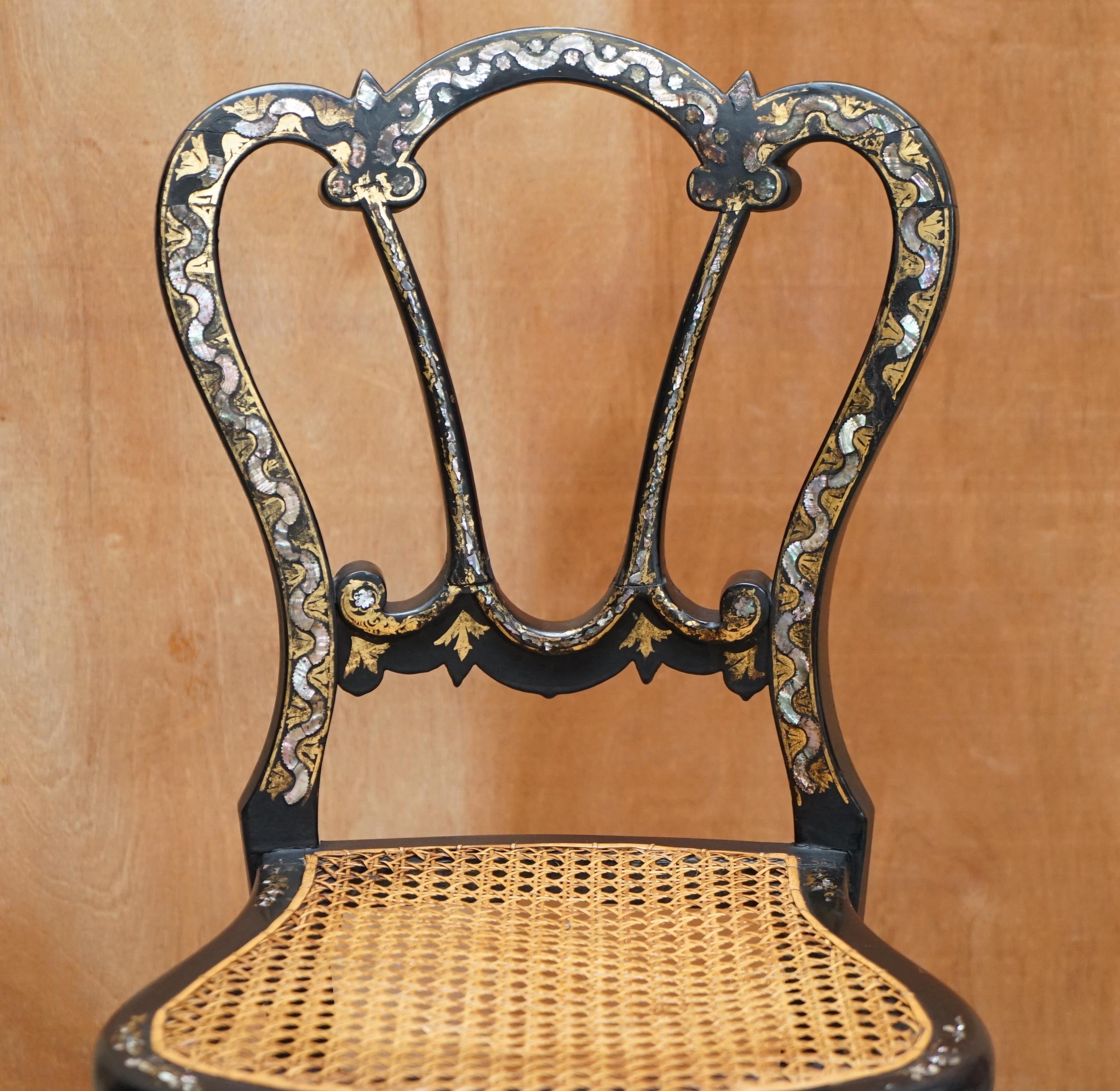 We are delighted to offer for sale this exquisite original circa 1815 Regency ebonised gold leaf painted and heavily mother of pearl inlaid occasional bergere chair

A very good looking well made and decorative chairs, this is one of the most