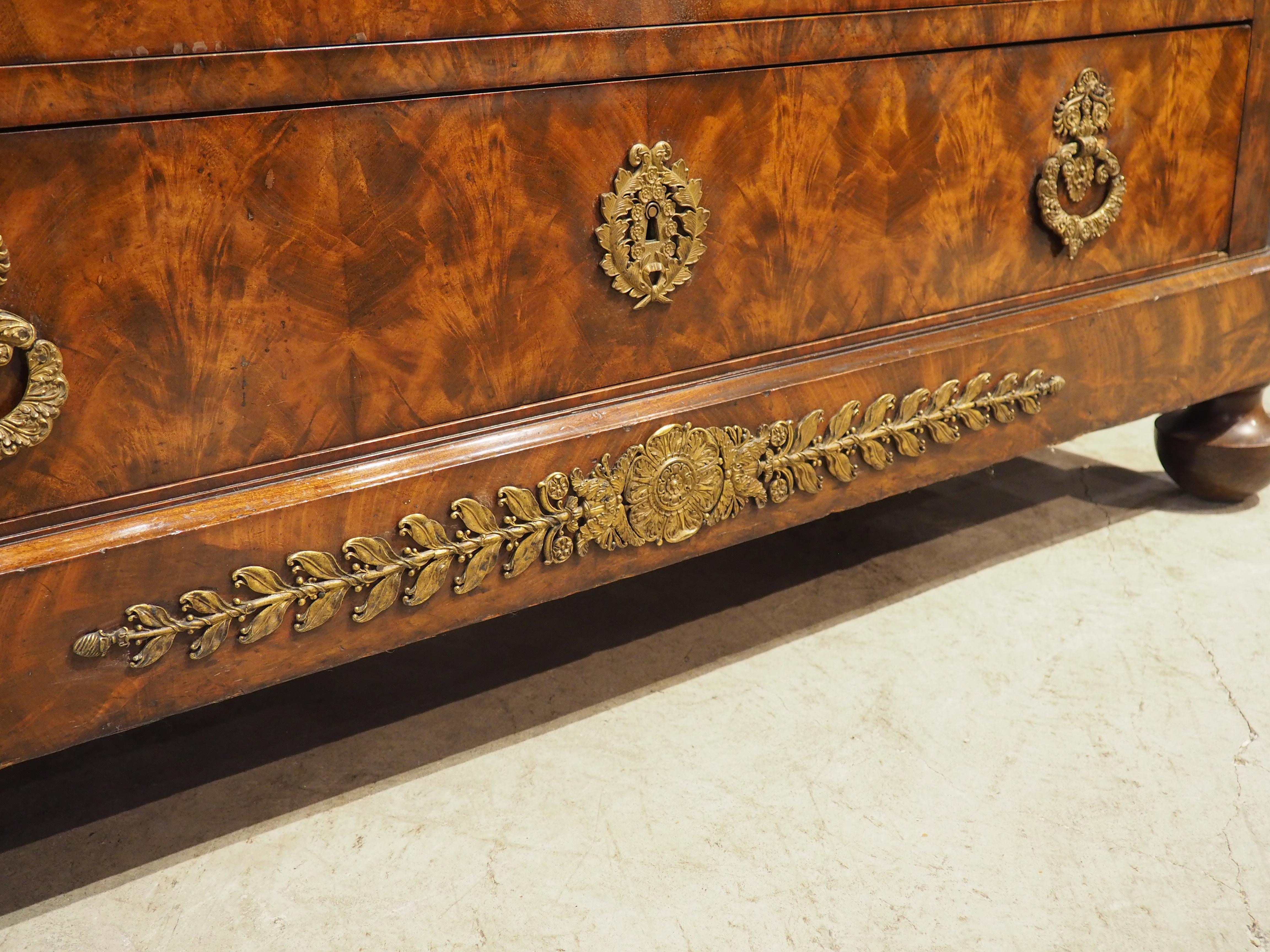Circa 1820 French Restauration Commode in Flame Mahogany, Gilt Bronze Hardware For Sale 9