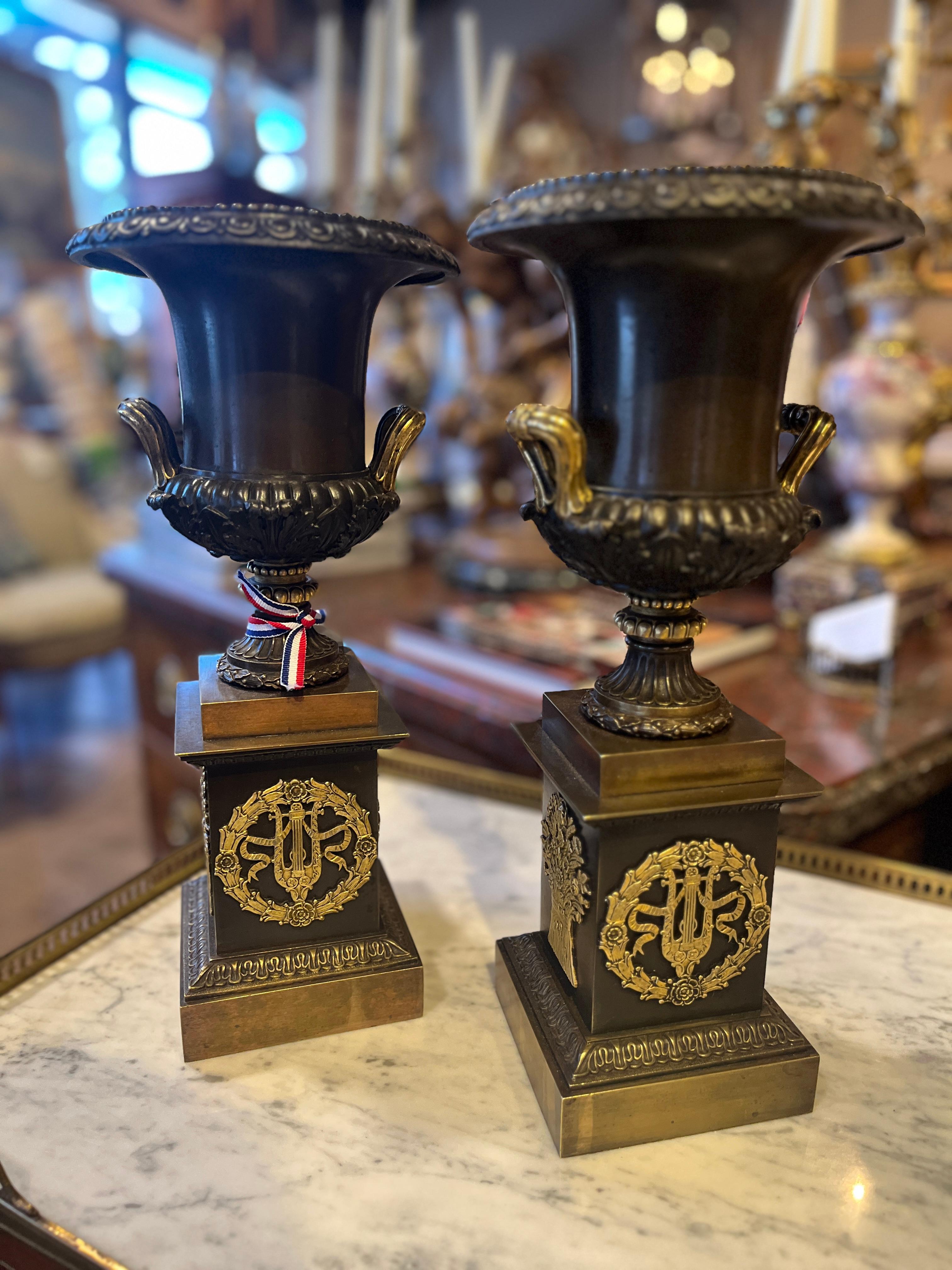 Circa 1820 Pair of French Empire Bronze Handled Urns
Beautiful pair purchased in France, age appropriate wear, see detailed photos or message us with questions. 