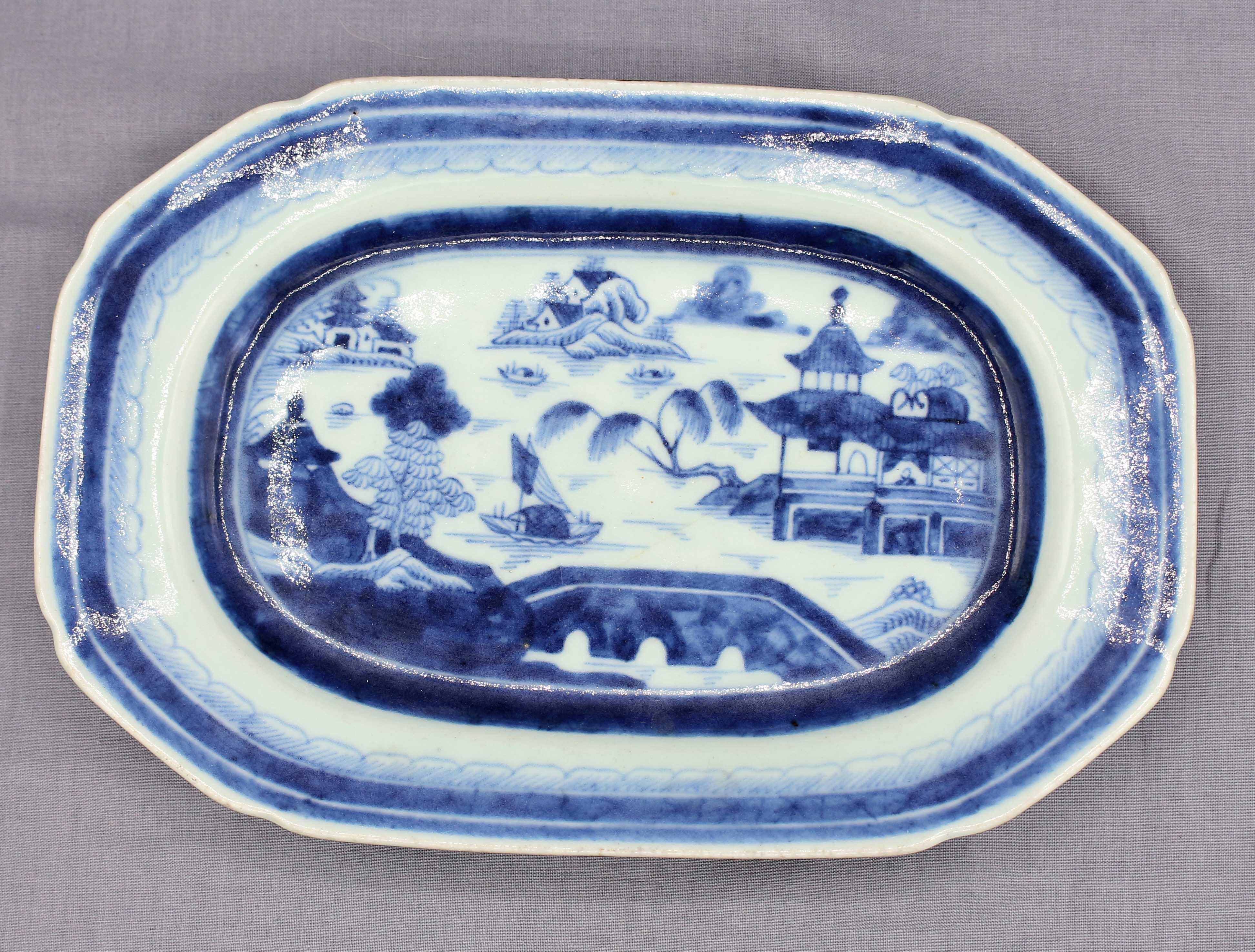 Circa 1830 Blue Canton small platter, Chinese export. Orange peel bottom. Porcelain. Modified octagonal form.
9 7/8