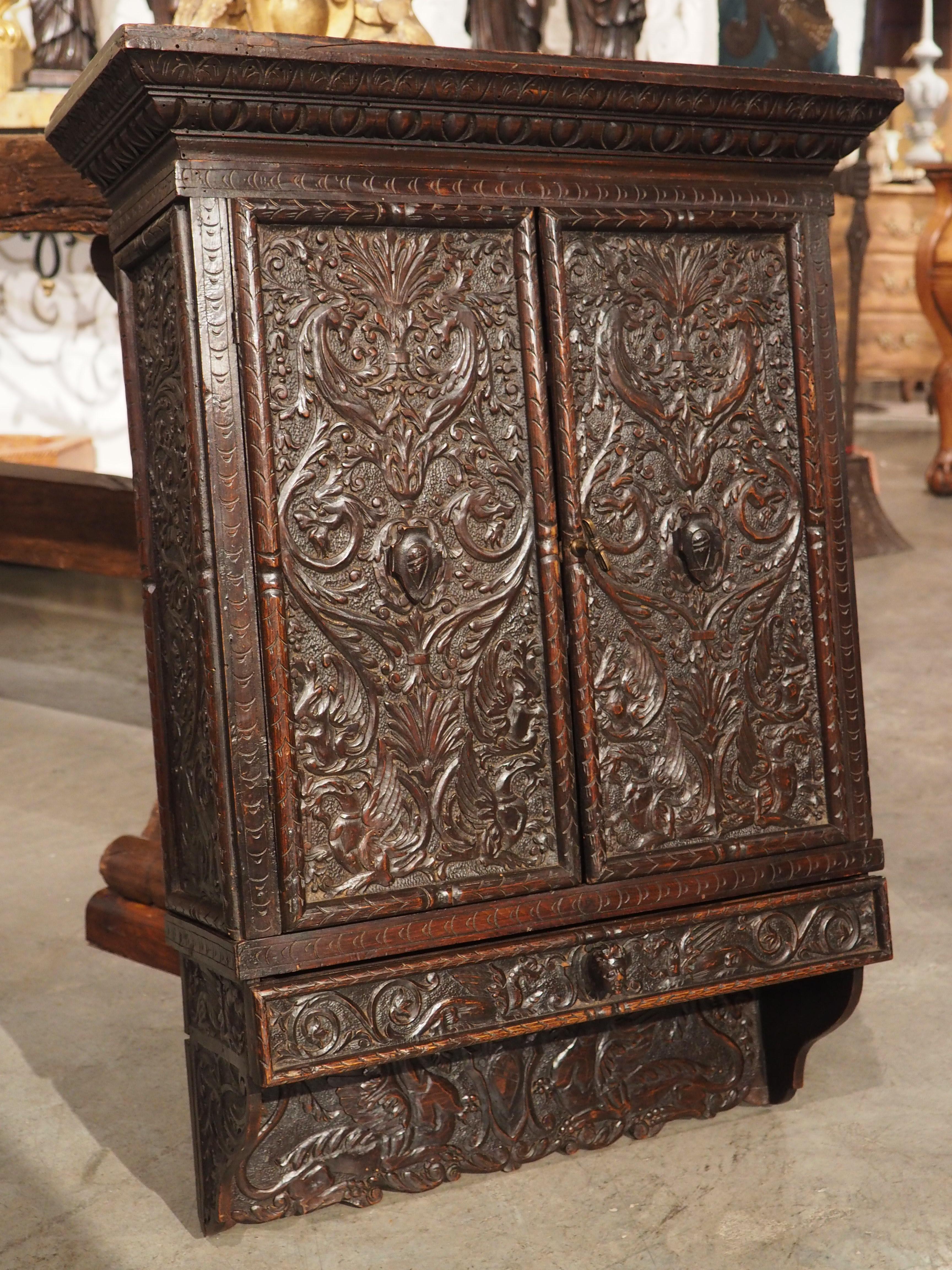 Circa 1830, Italian, Walnut Wood Wall Cabinet in the Renaissance Style For Sale 13