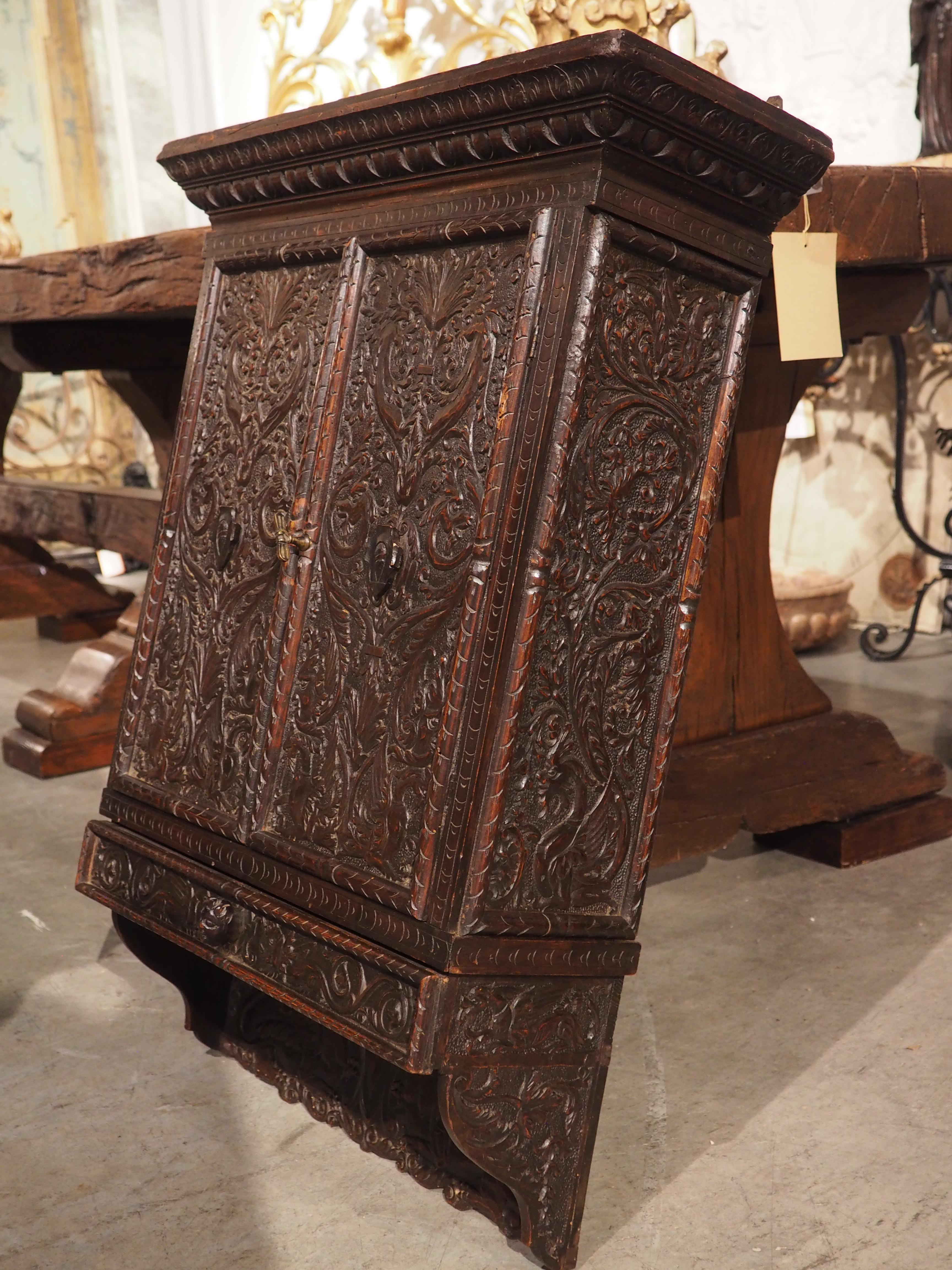 Circa 1830, Italian, Walnut Wood Wall Cabinet in the Renaissance Style In Good Condition For Sale In Dallas, TX