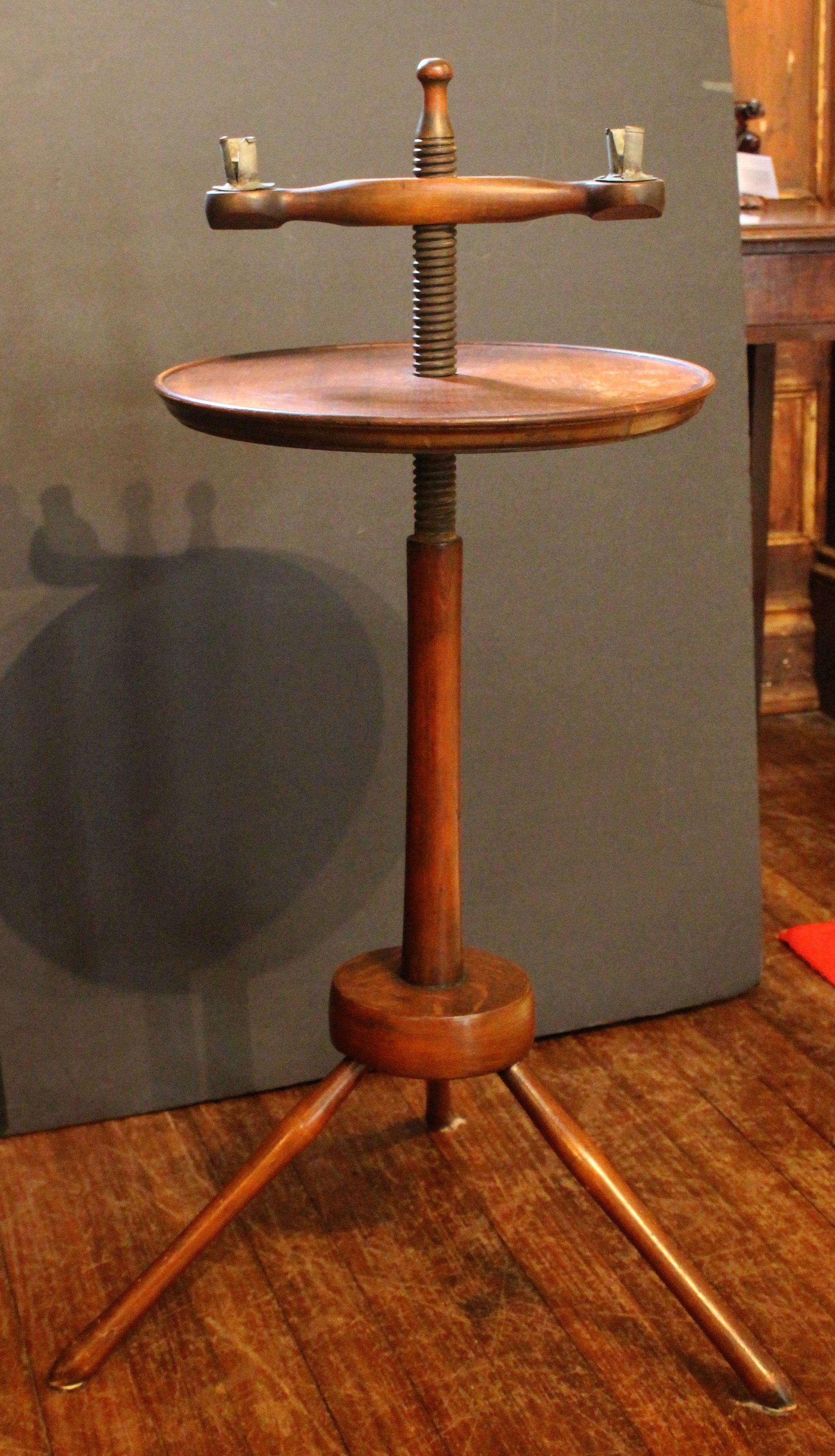 Circa 1830s English Windsor screw-top double light candlestand. Both candle arm & dished top are adjustable. Mix of beech, hickory & oak. Red paint under base disc, green inside arm turnings. Typical Windsor turnings. Heavily refinished in the later