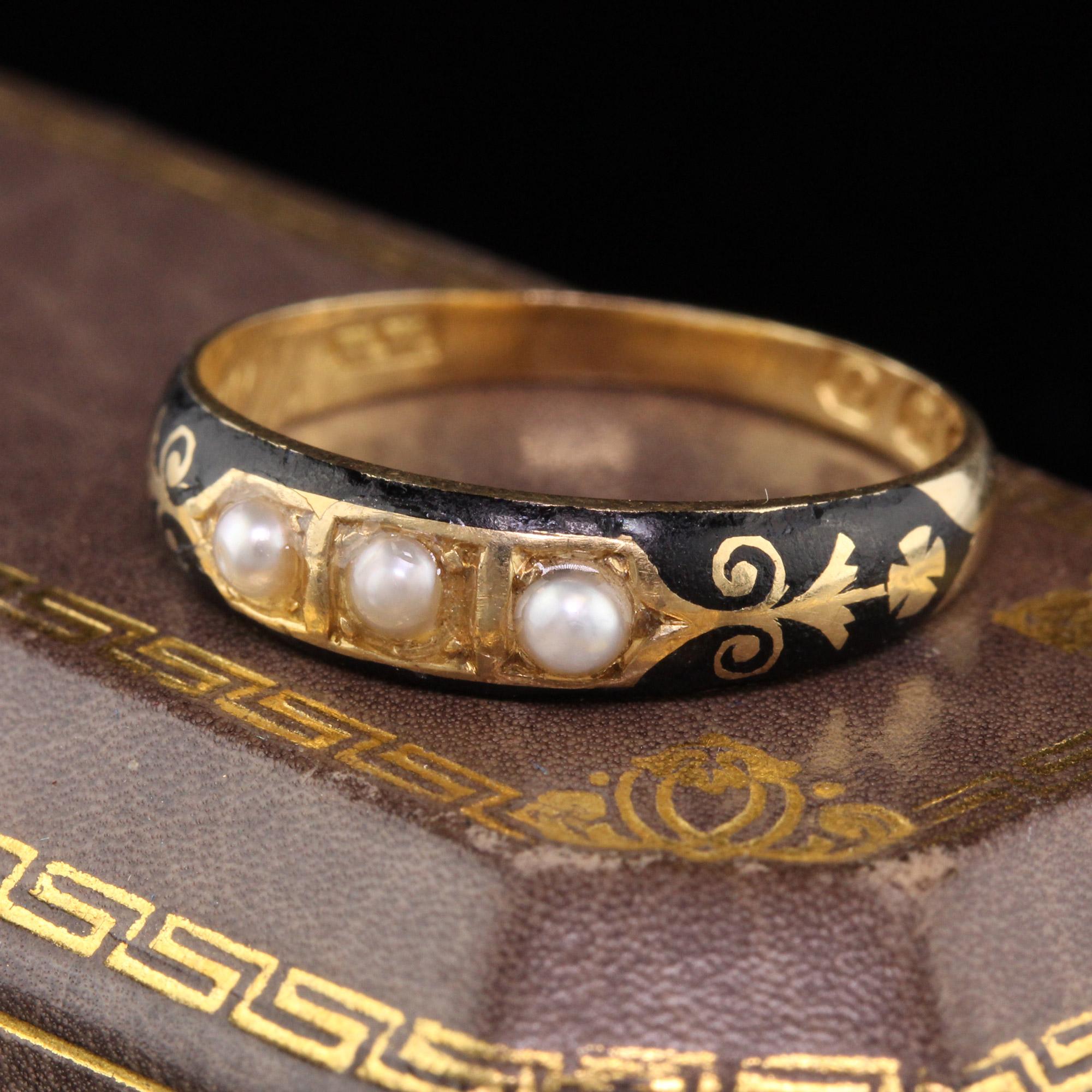 Sweet Georgian mourning ring circa 1836 in yellow gold with black enamel and 3 natural pearls. Fully engraved and hallmarked inside the shank. In excellent condition.

#R0194

Metal: 18K Yellow Gold 

Weight: 2.7 Grams

Ring Size: 7 (sizable)

This