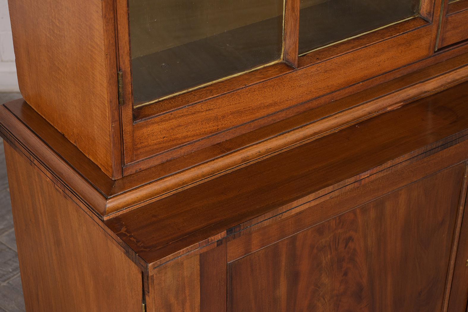 Patinated English Regency Style Mahogany Finish Two Doors Bookcase, circa 1840