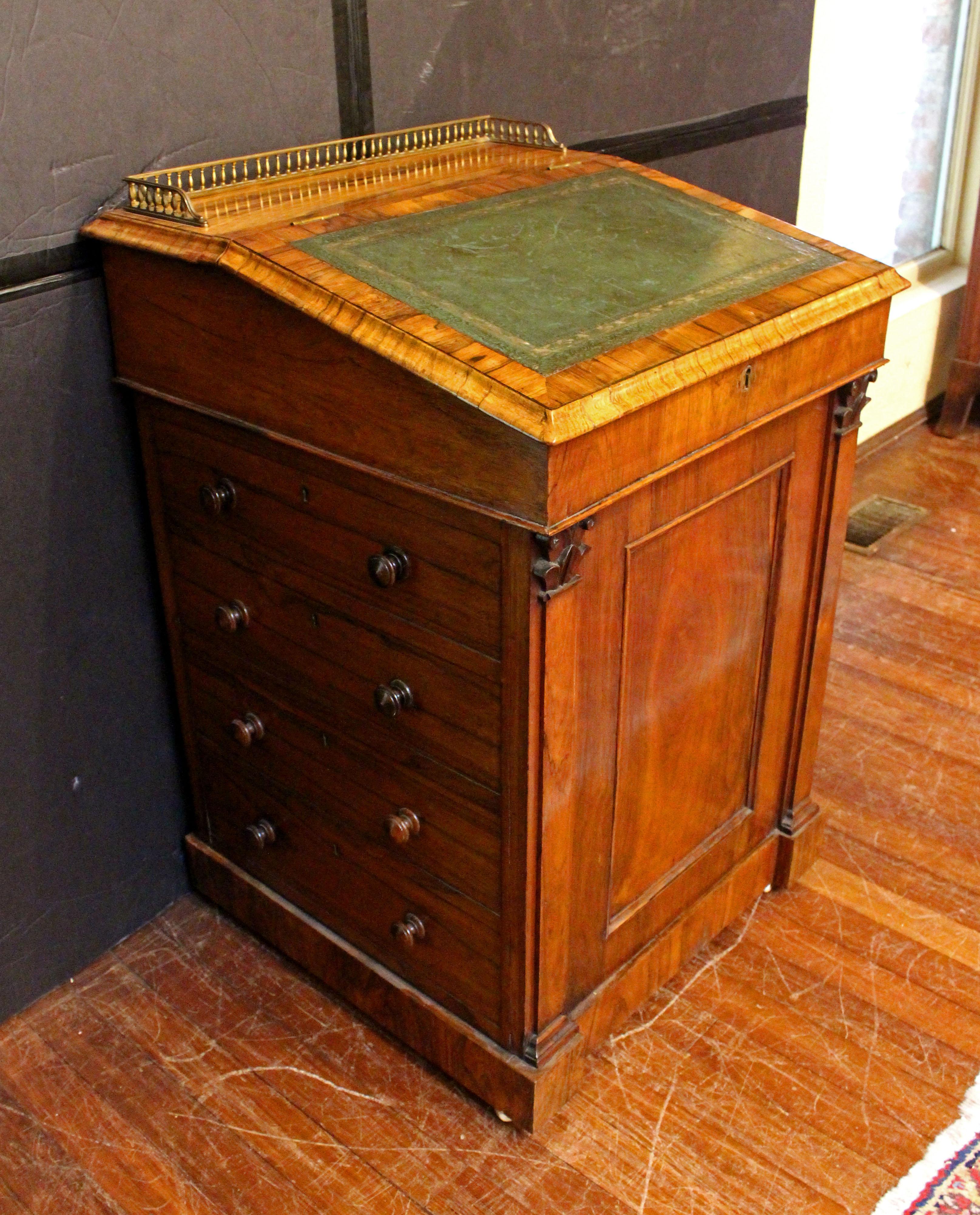Circa 1840 Irish davenport desk by Dublin cabinet maker J.J. Byrne. Maker's stamp in 3rd drawer. J.J. Byrne, 6 Henry St., Dublin. This restrained William IV design features flat pilasters to the front, sliding work surface for ease of sitting to