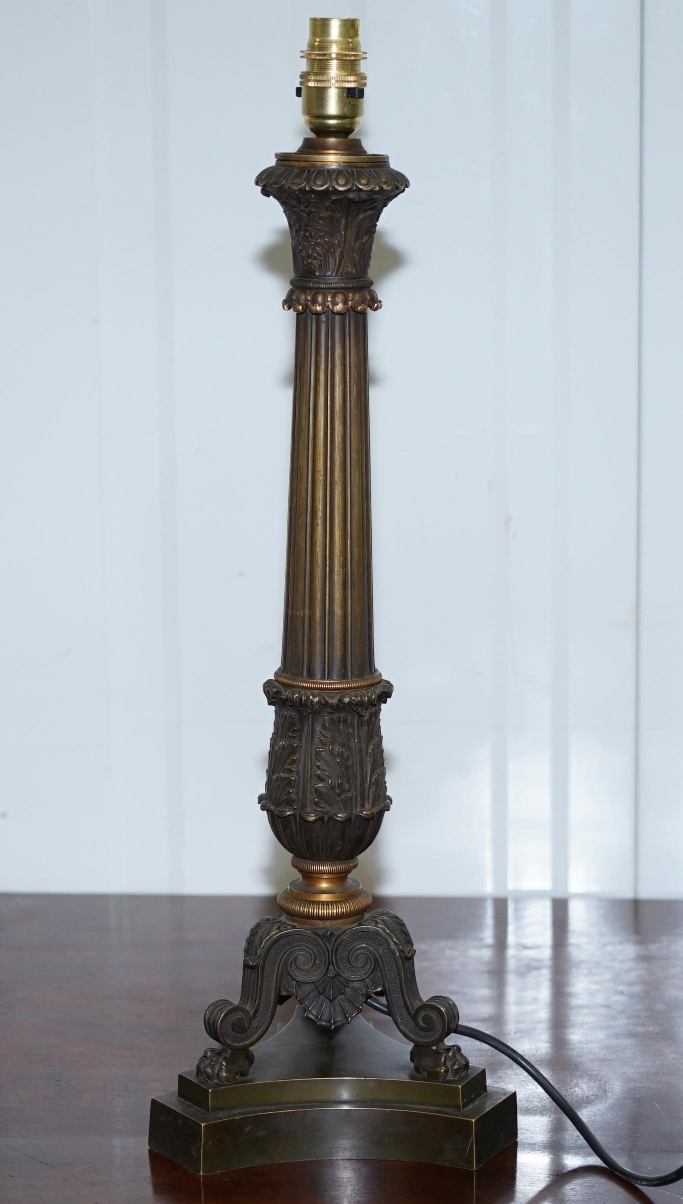 We are delighted to offer for sale this very rare large solid bronze Corinthian pillar table lamp with Lion hairy paw feet

A stunning piece, it adds style charm and charisma to any setting

The lamp has been fully restored to include a new