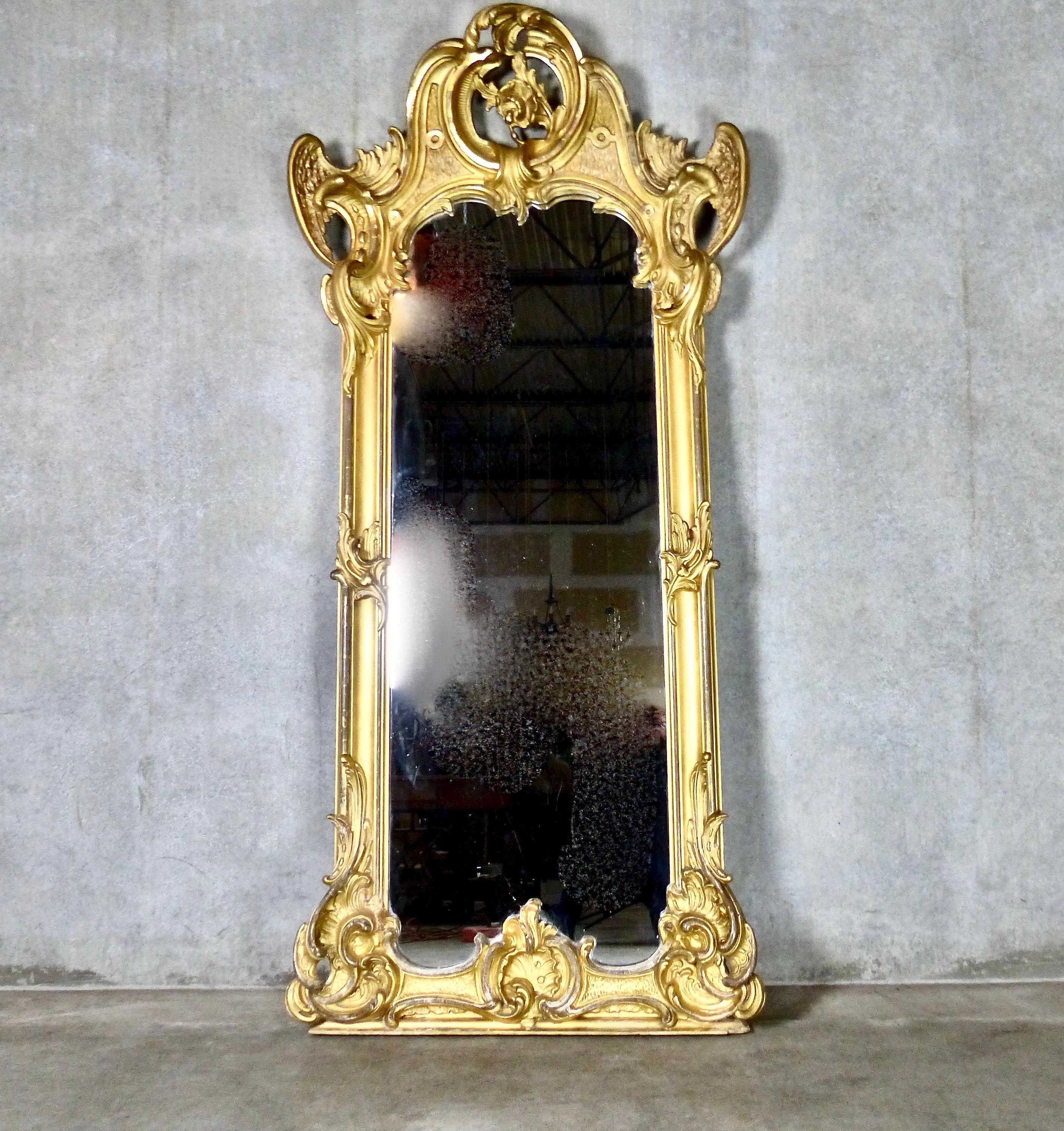 Mid-19th Century Spectacular French Water Gilt Mirror with Accented Carved Angel Wings circa 1840