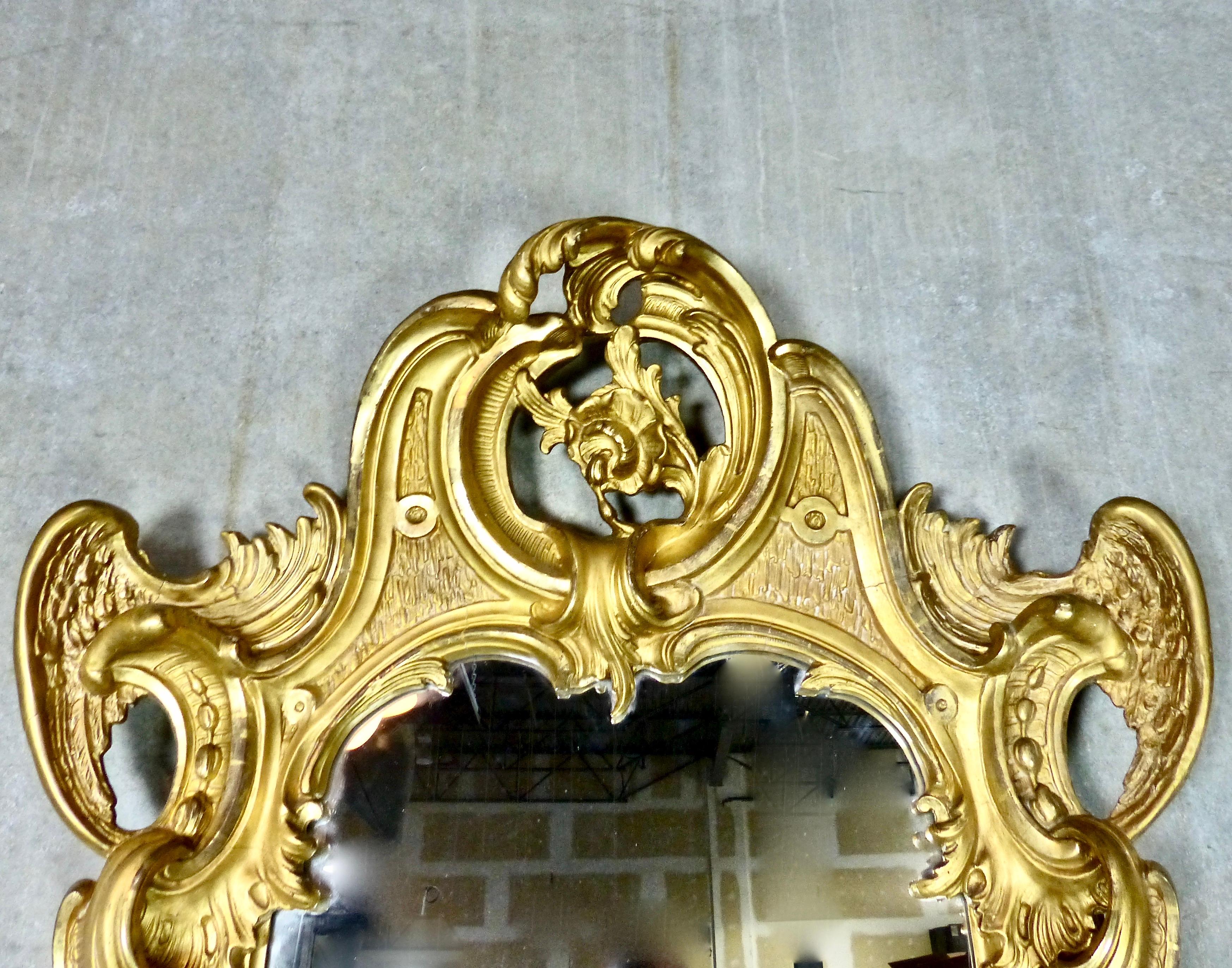 Giltwood Spectacular French Water Gilt Mirror with Accented Carved Angel Wings circa 1840