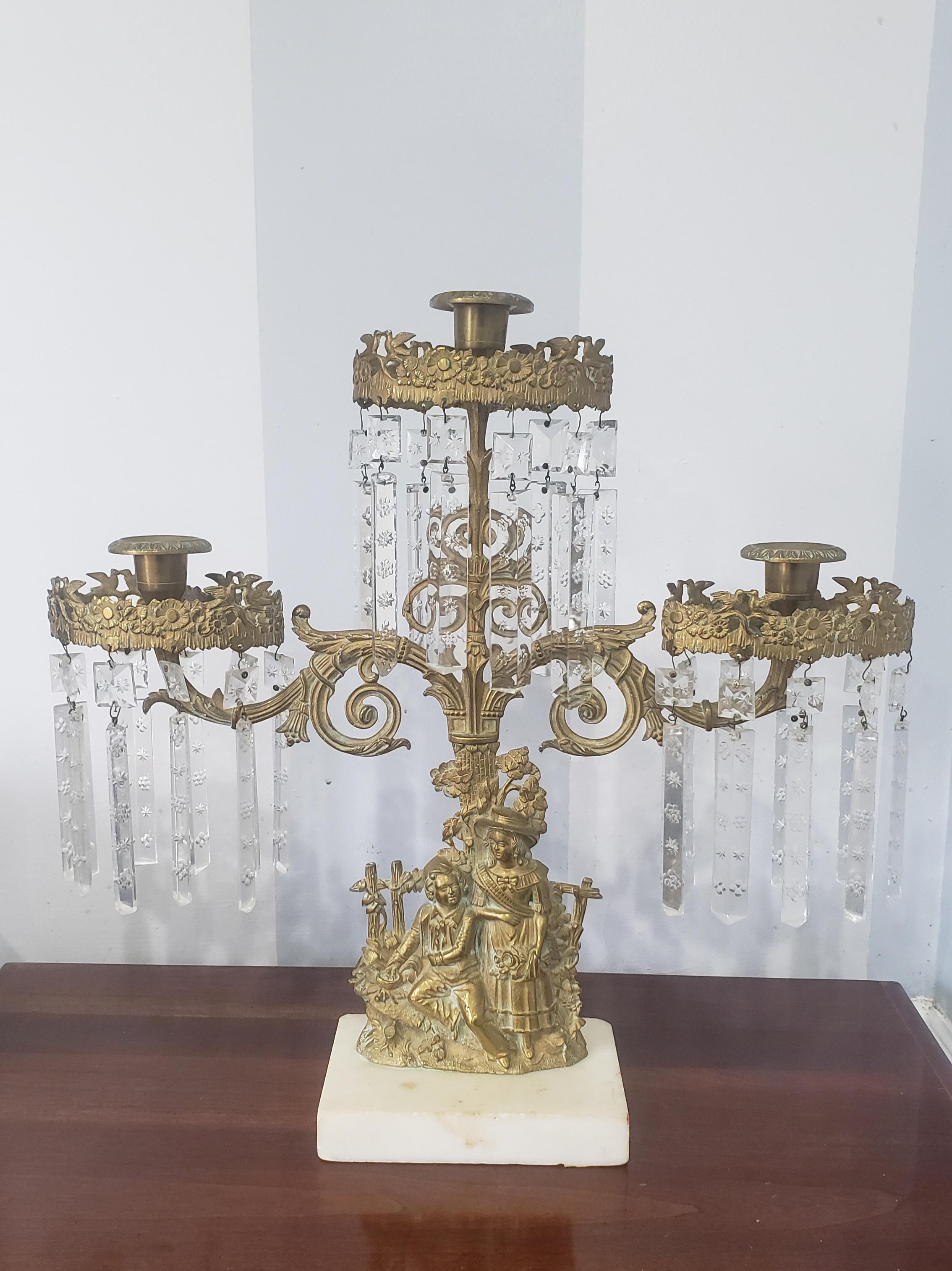 A pair of 1840s Cornelius and Co. Cast brass & marble three arms Girandole Candlelabra with crystal pendulums.
Measures 16.25