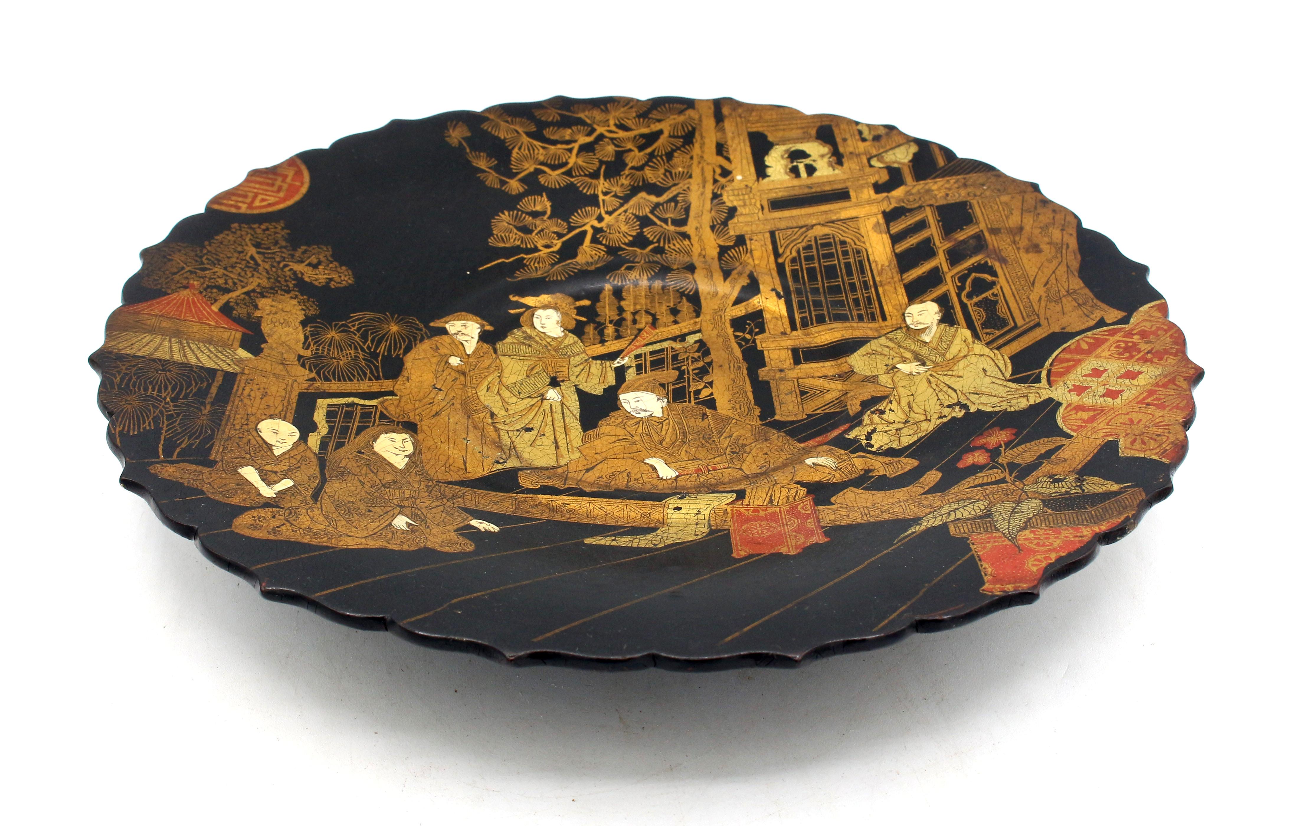 Circa 1850 Chinese export papier mache footed tray. Exquisitely hand painted & gilded. Minor rubbing & darkening commensurate with age, material & use.
11 3/8