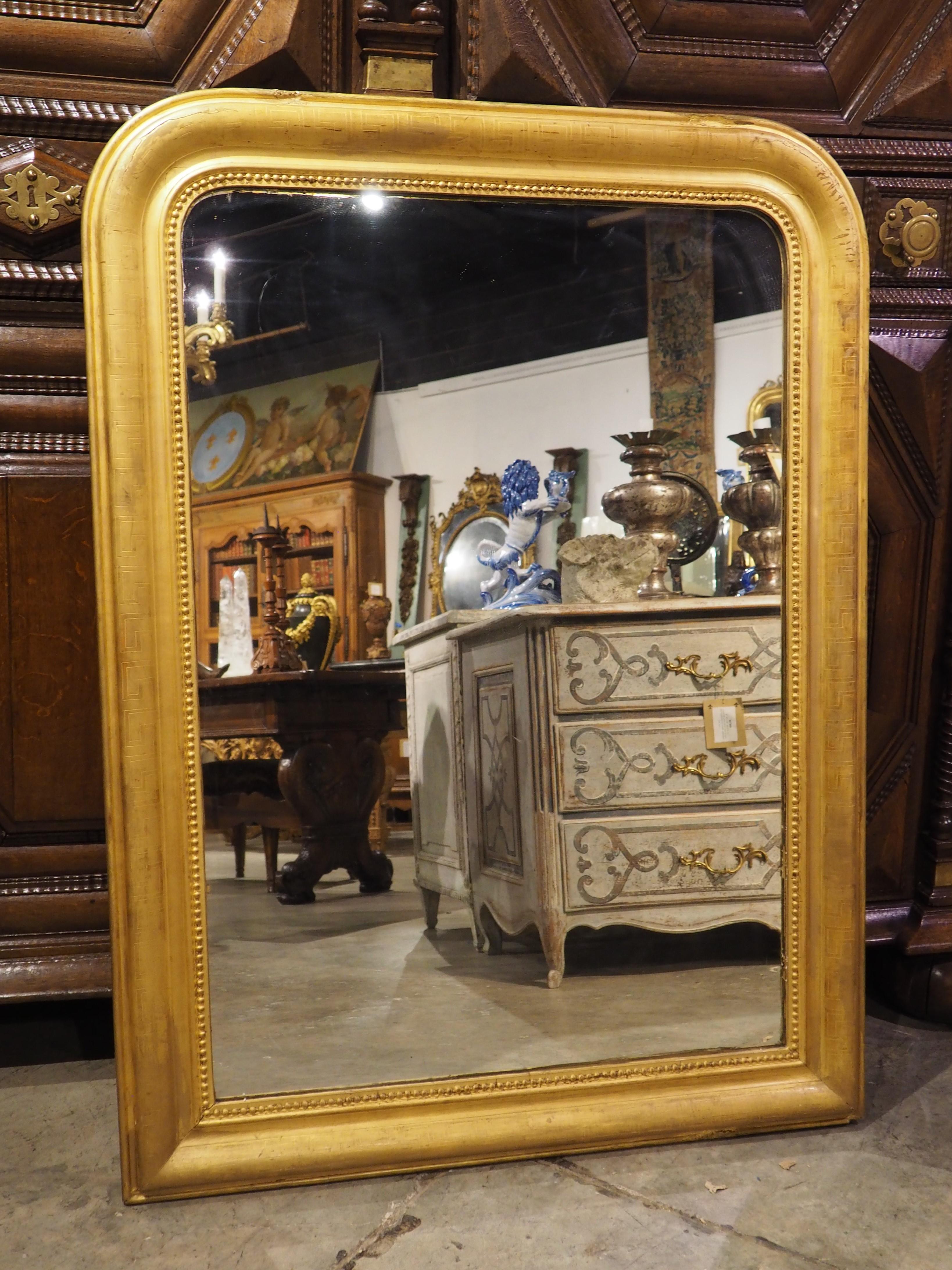 Louis-Philippe Miroir Louis Philippe français en or avec motif de clé grecque datant d'environ 1850 en vente