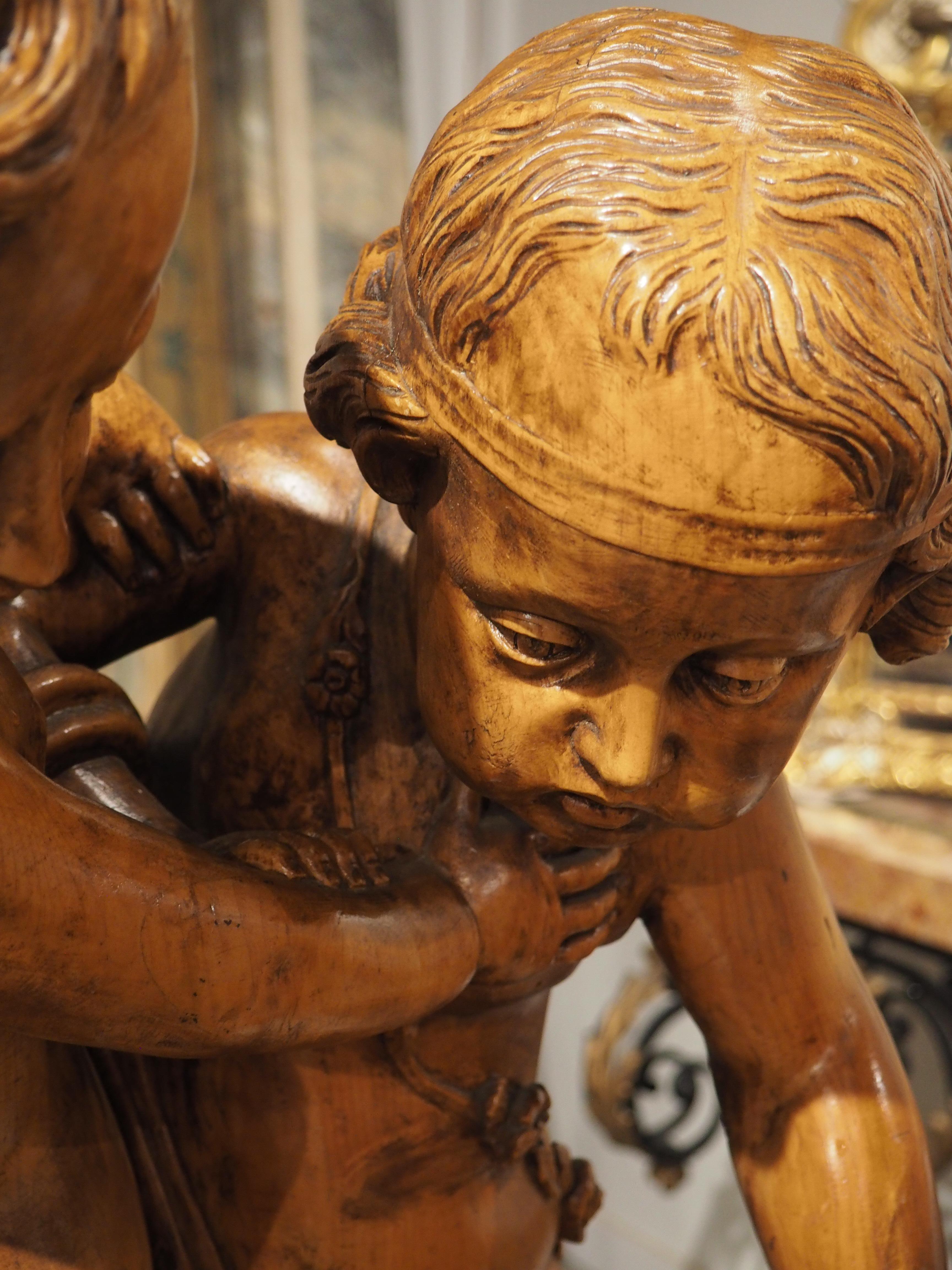 Mid-19th Century French Sculpture of Two Cupids Contesting a Heart, After E. Falconet, circa 1850 For Sale