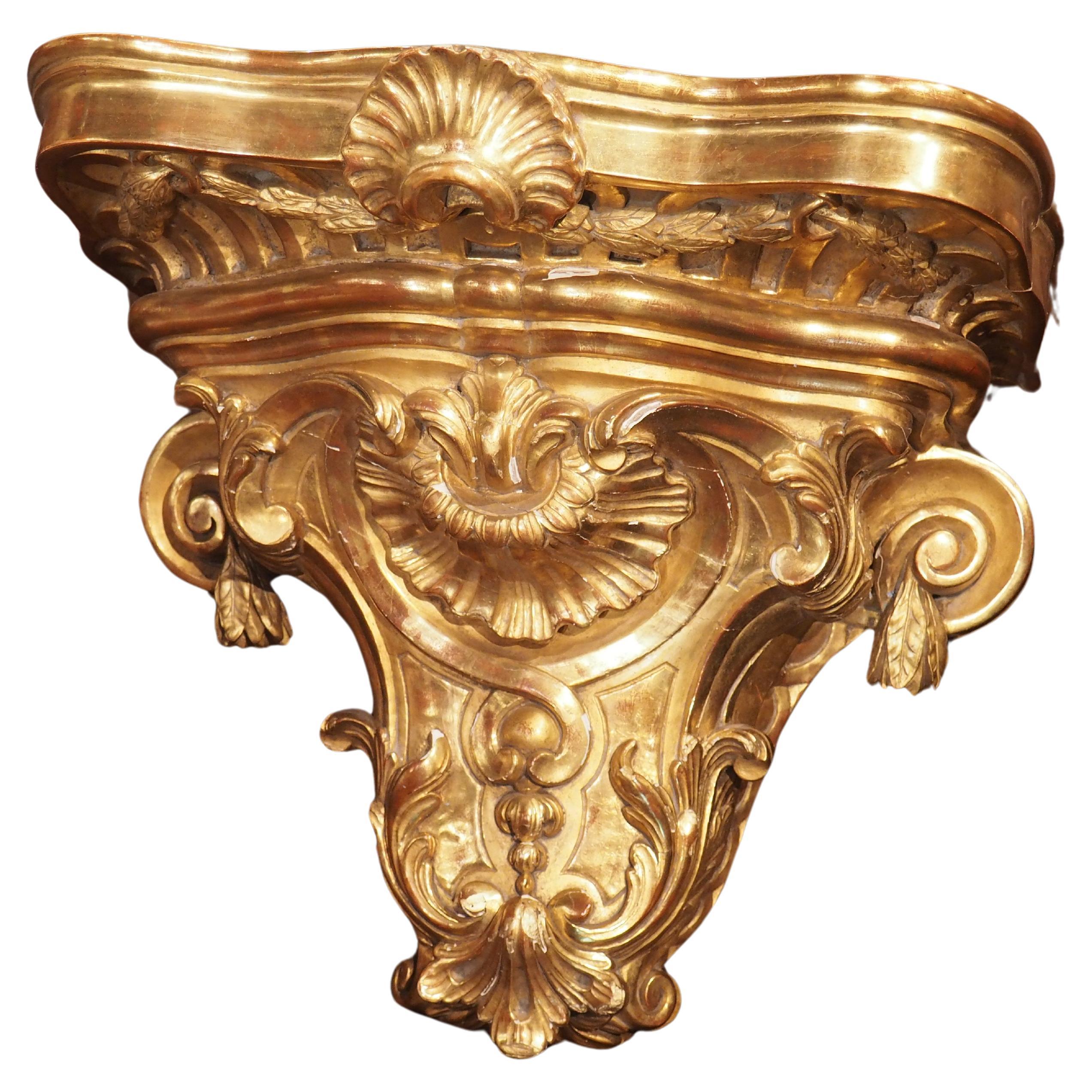 Circa 1850 Hand Carved Giltwood Wall Bracket from France For Sale