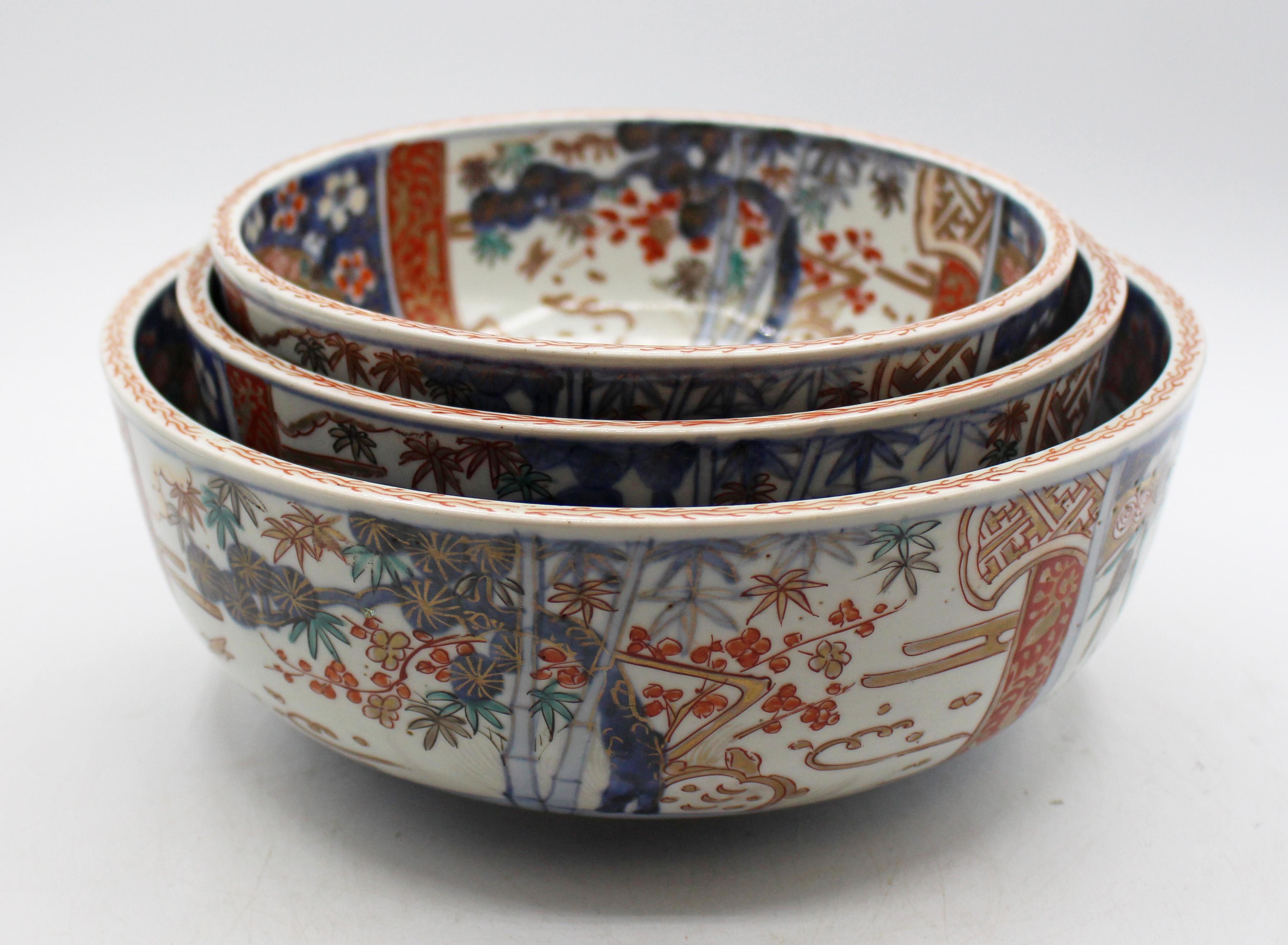 Circa 1860-80 nest of 3 Imari Bowls, Meiji period, Japan. Each centered by a Kirin (Qilin in China), the mythical gentle beast, a sympol of good fortune & prosperity. Large interior & exterior reserves of flora & fauna, birds & turtles. Classic