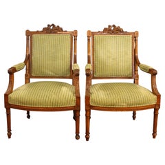 Circa 1860-80 Pair of Louis XVI Style Walnut Fauteuils