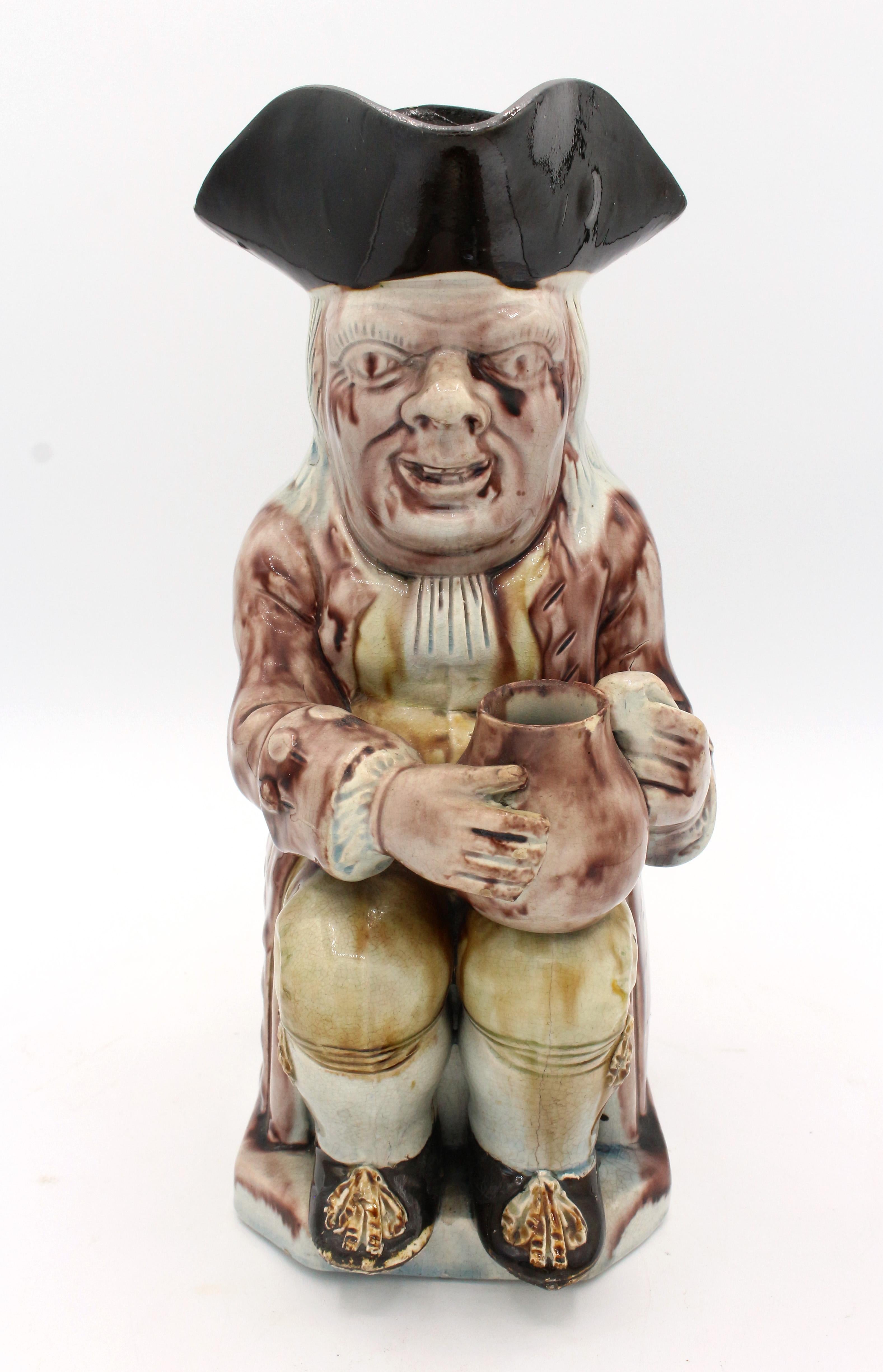 Circa 1860-80 Toby jug of a 'collier' with jug, English. Toby Philpot model, Whieldon type. Most interestingly, this is one of a small group of Toby jugs purporting to be circa 1790, none of the Toby scholars as yet have identified this producer of