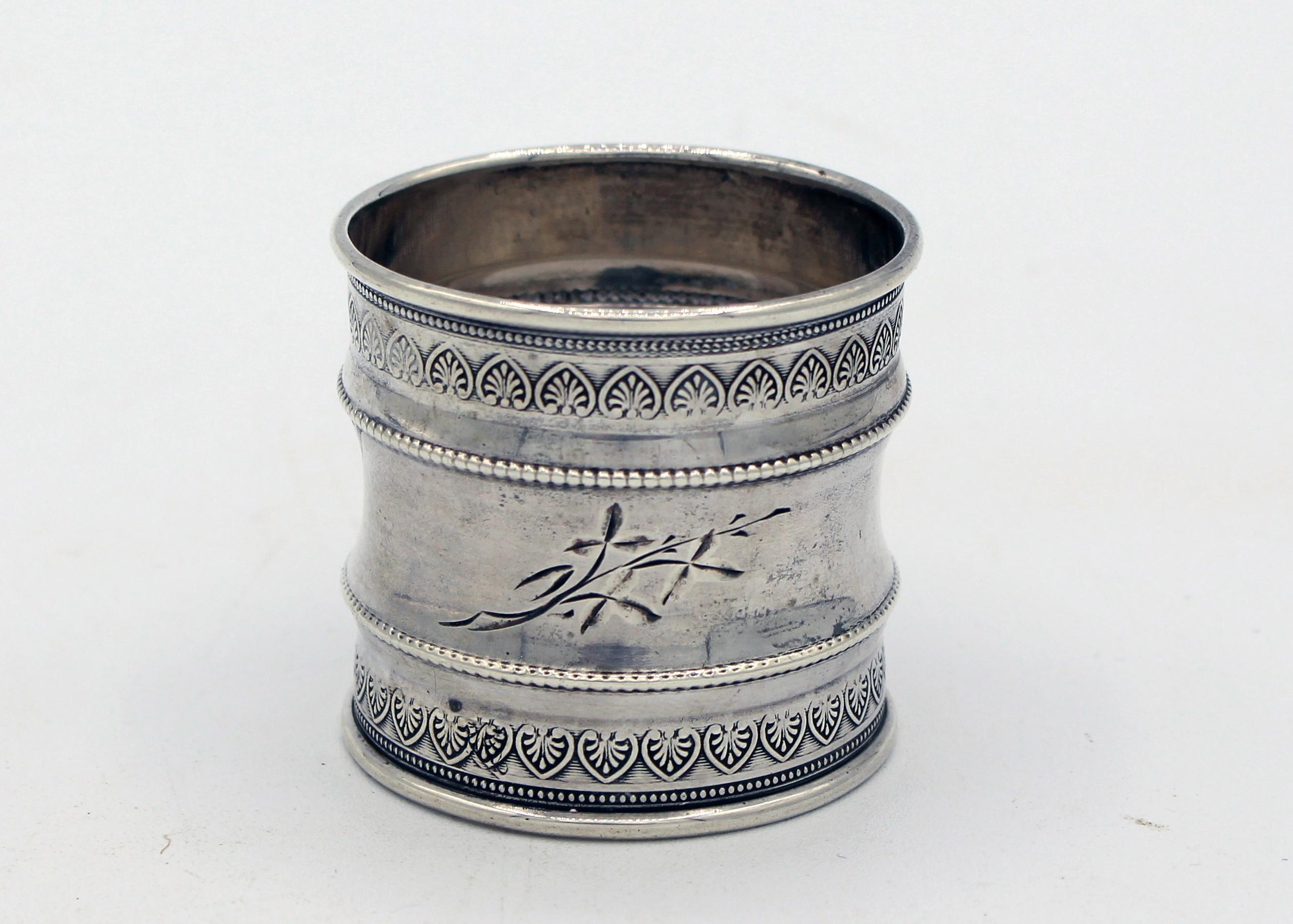 Elegant, large napkin ring anthemion borders, arches, and leaves. Coin silver, c.1860s. Unmarked except style #182. 1 11/16