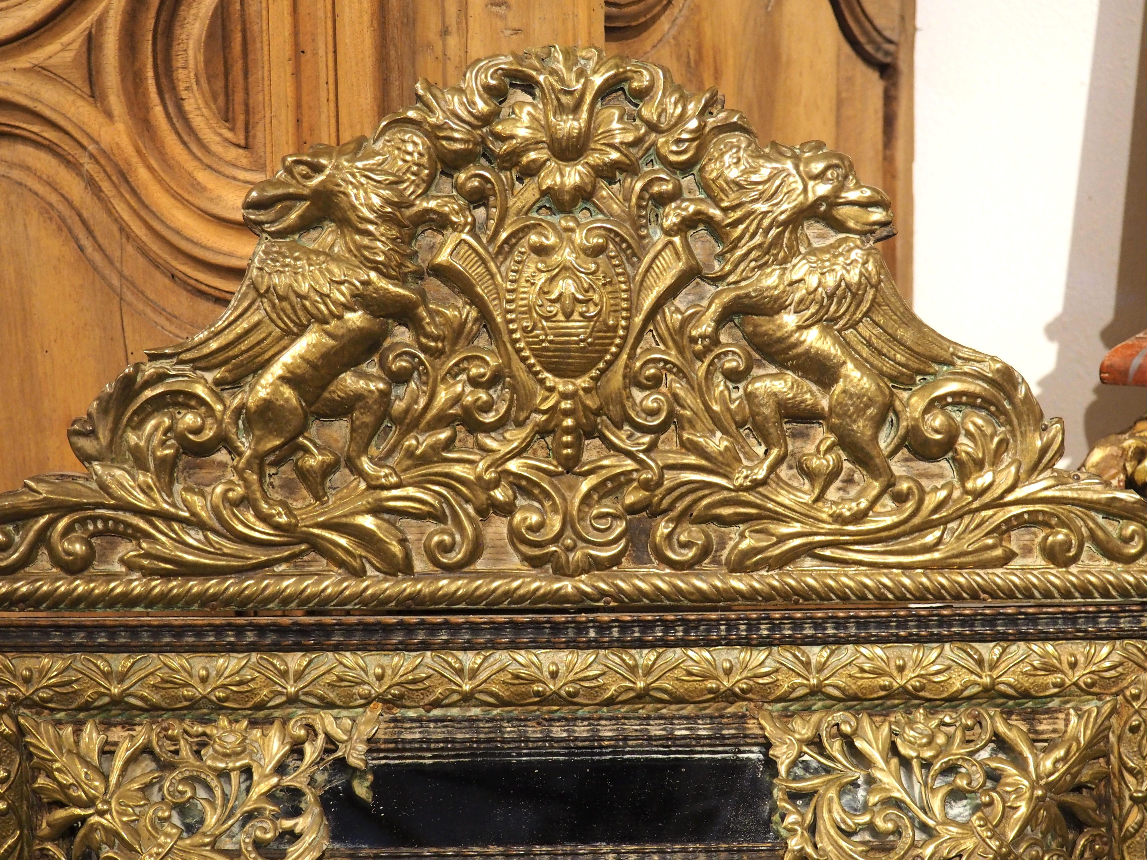 Dutch Circa 1860 Ebonized and Brass Repousse Louis XIV Style Parclose Mirror For Sale
