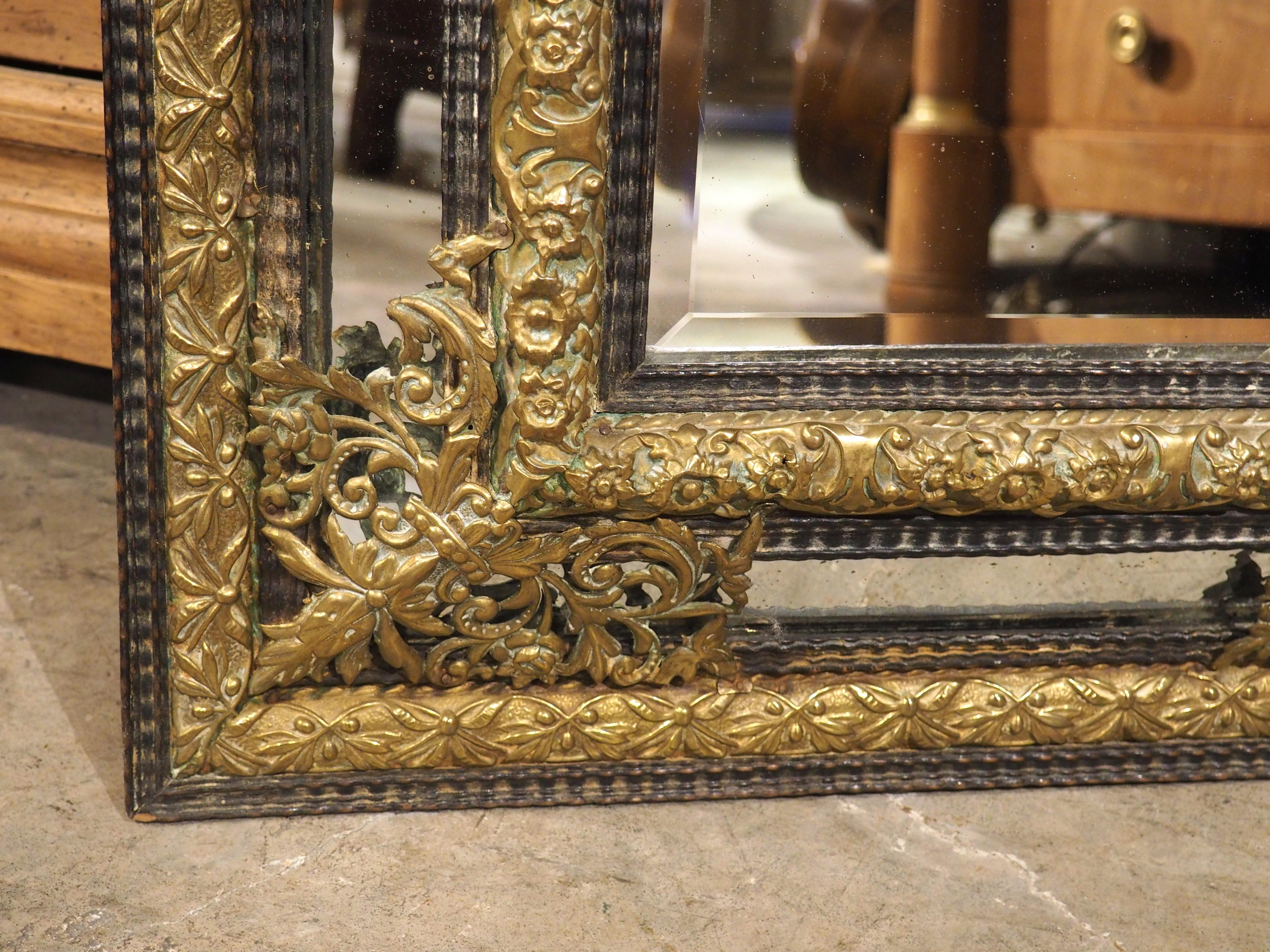 Circa 1860 Ebonized and Brass Repousse Louis XIV Style Parclose Mirror In Good Condition For Sale In Dallas, TX