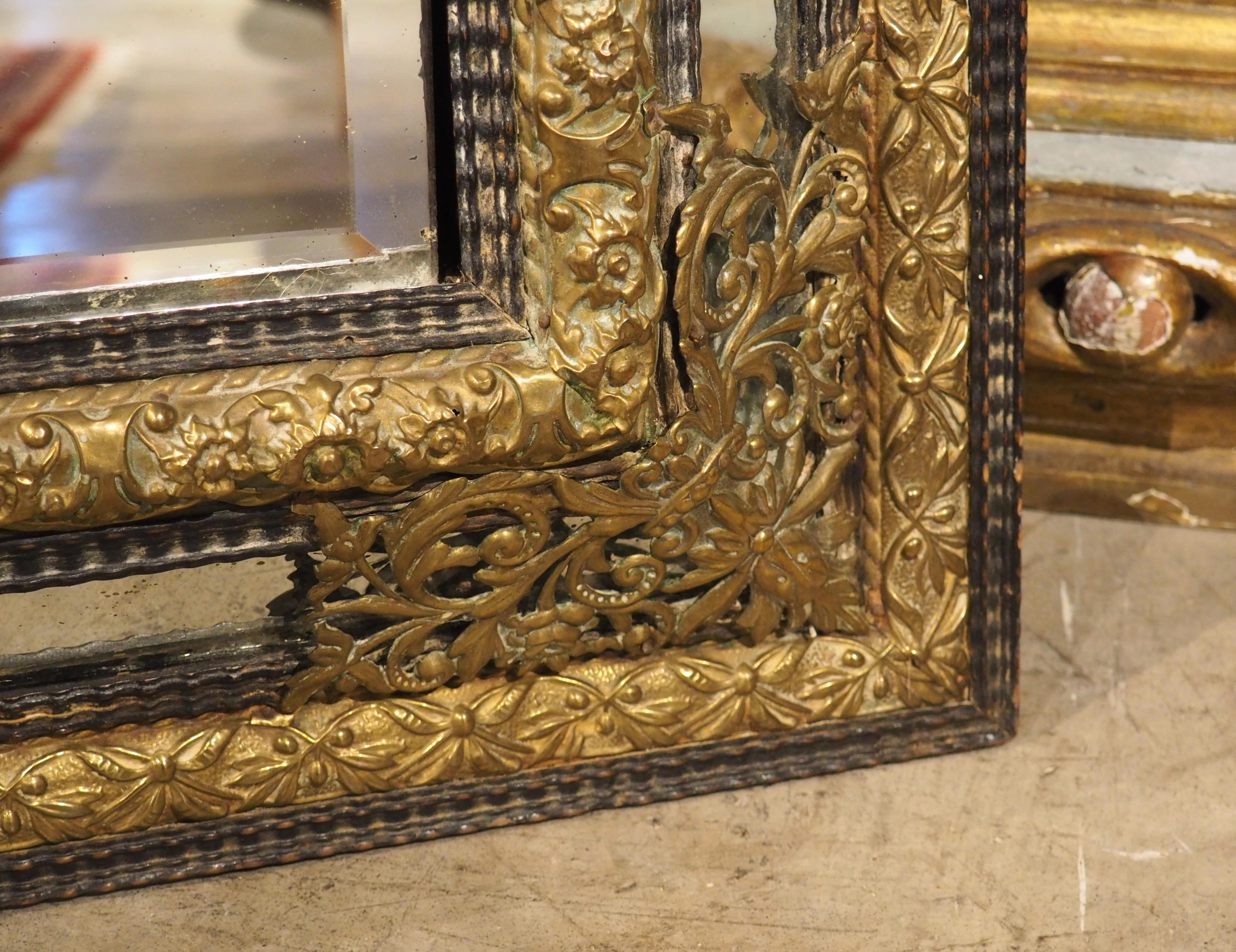 Metal Circa 1860 Ebonized and Brass Repousse Louis XIV Style Parclose Mirror For Sale