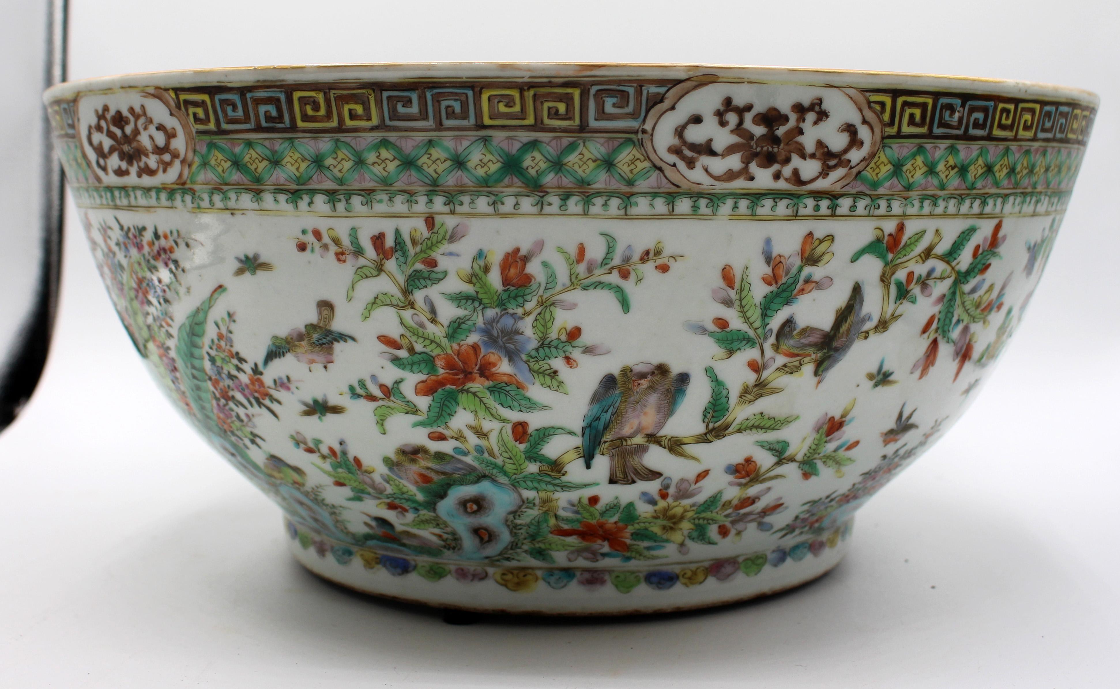 Chinese Export Porcelain Famille Verte Punch Bowl, circa 1860, Qing Dynasty. A marvelous, rare design ornithological motif. Greek key outer borders define large panels of birds wading, flying & in tree branches. A few glaze pops & rubbed spots