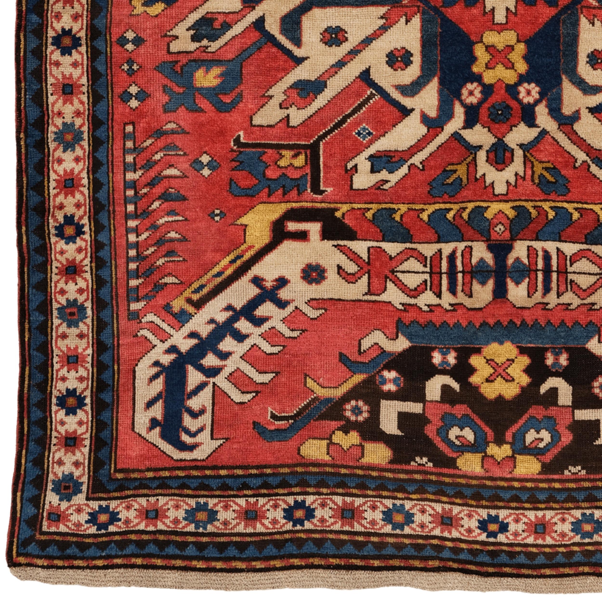This magnificent 1870s antique Caucasian Eagle rug stands out with its rich cultural heritage and unique craftsmanship. Caucasian rugs are known for their traditional motifs and vibrant colors, and this particular piece is one of the finest examples