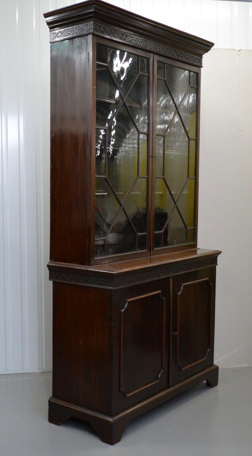 Hand-Crafted CIRCA 1870 CHIPPENDALE REVIVAL HARDWOOD BOOKCASE, MOULDED OUTSWEPT CORNiCE ABOVE For Sale