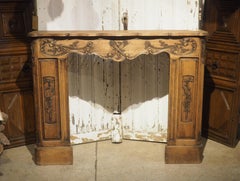 Circa 1870 French Walnut Fireplace Mantel with Trophies of Music and the Arts