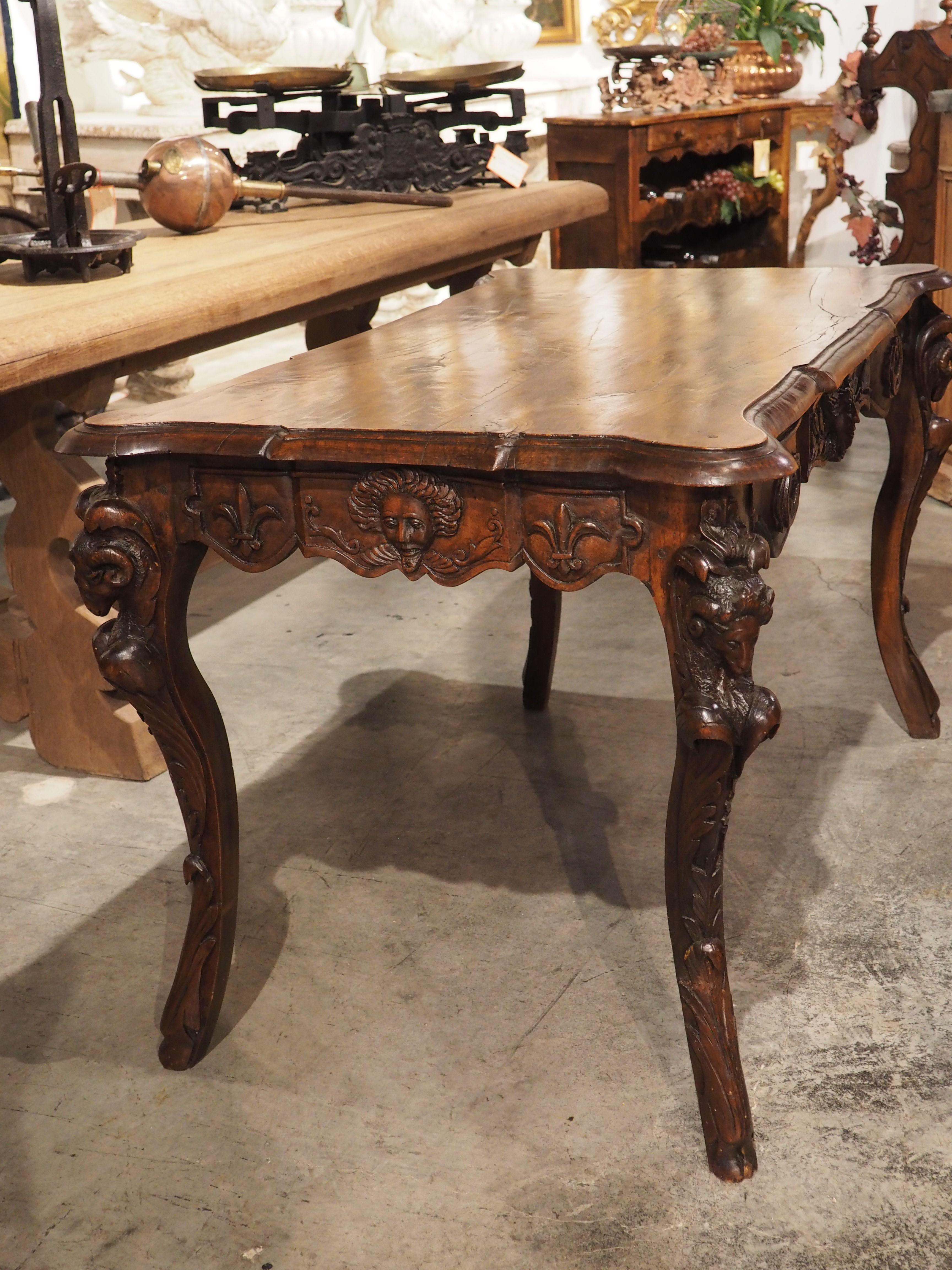 Louis XIV Circa 1870 French Walnut Wood Center Table with Rams' Heads and Fleur De Lys For Sale