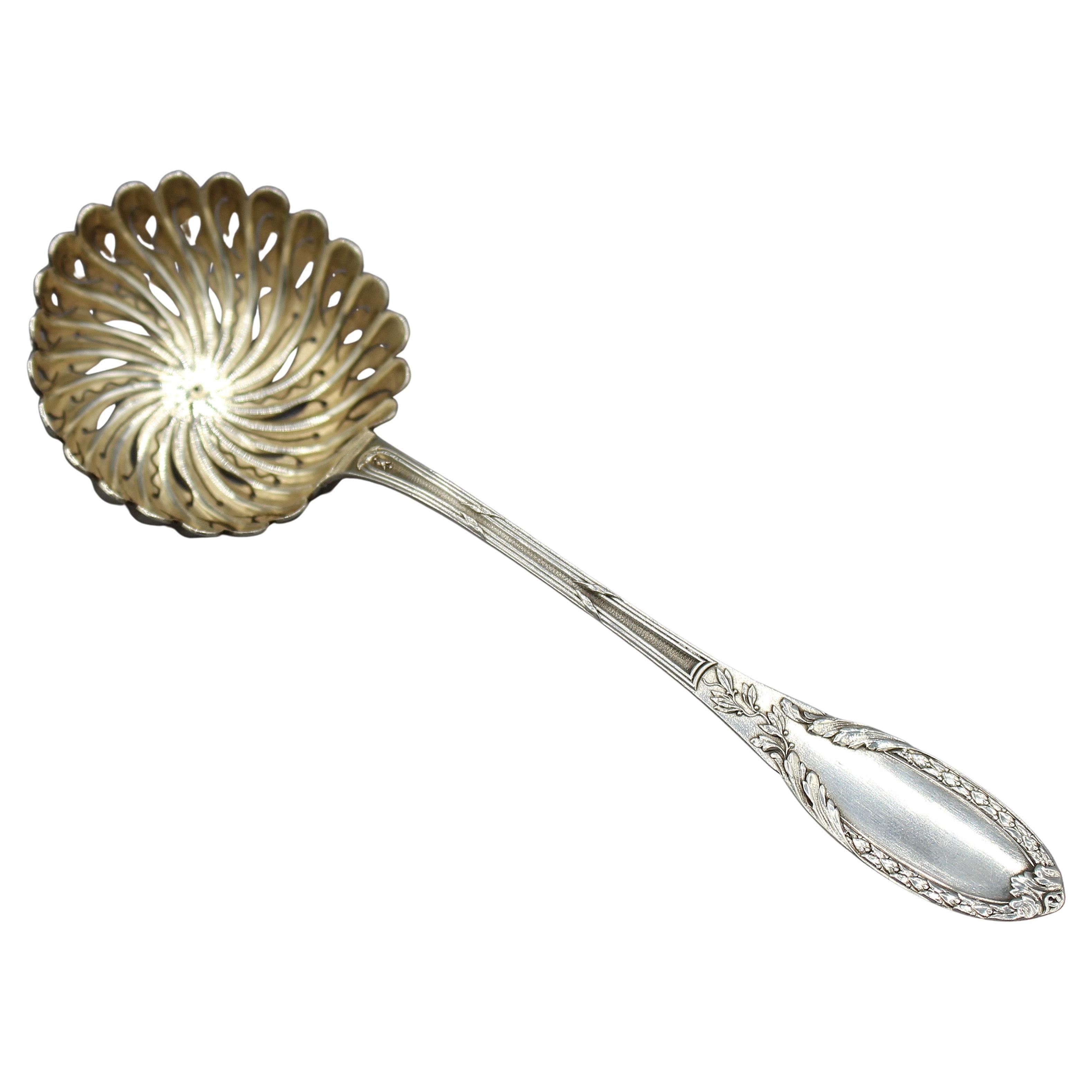 Cuchara tamiz de plata francesa de la década de 1870