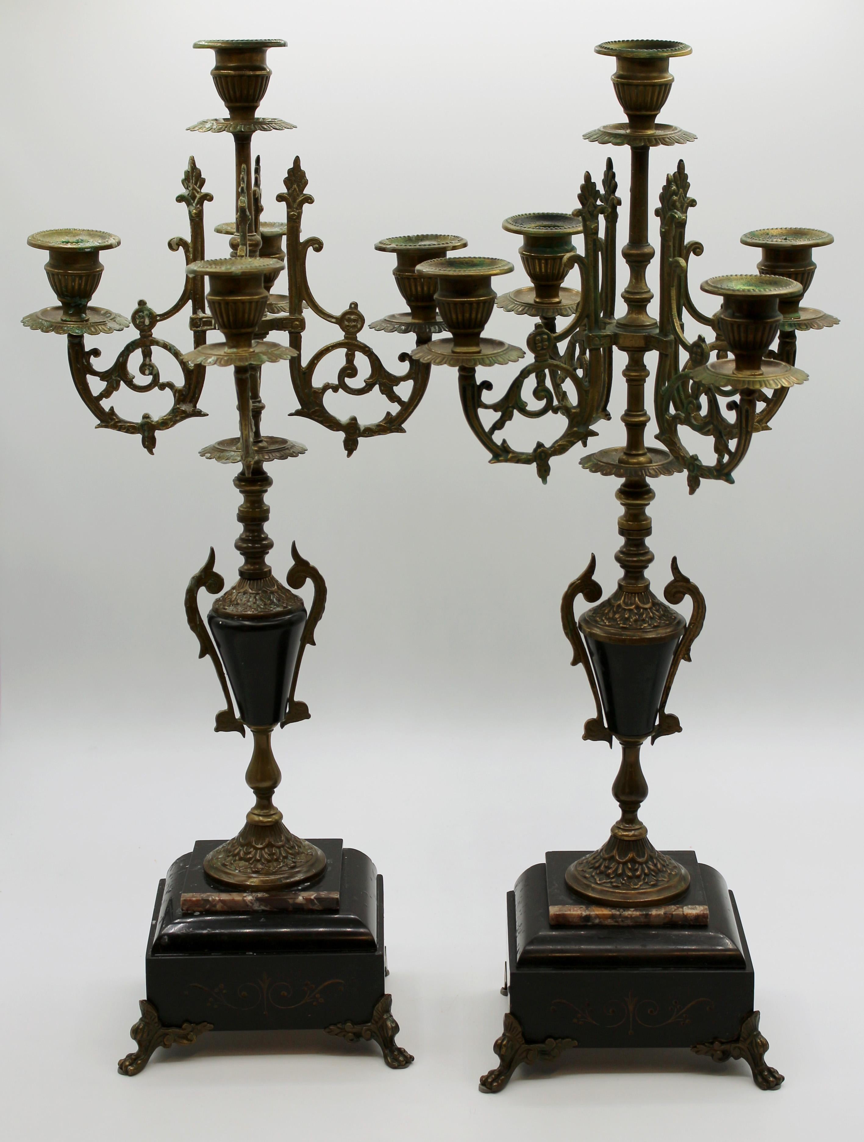 Circa 1870s pair of candelabras, Anglo-American, black slate and cast brass. The slate engraved and gilded. Inset slice of variegated marble accent. Measures: 18.75