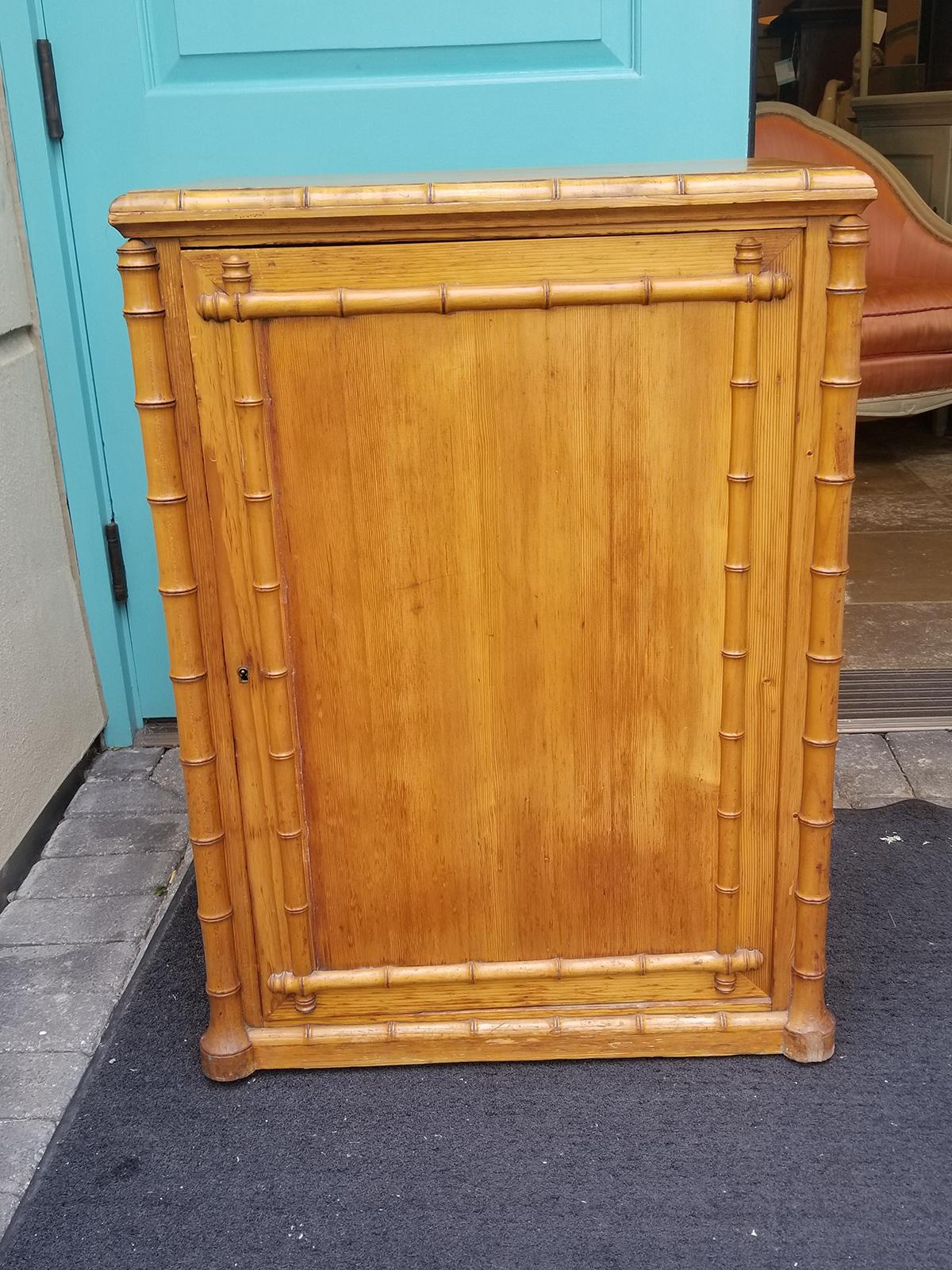 Circa 1880-1900 French bamboo style one door cabinet.