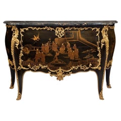 Circa 1880 A FRENCH ORMOLU-MOUNTED GILT AND BLACK LACQUER COMMODE