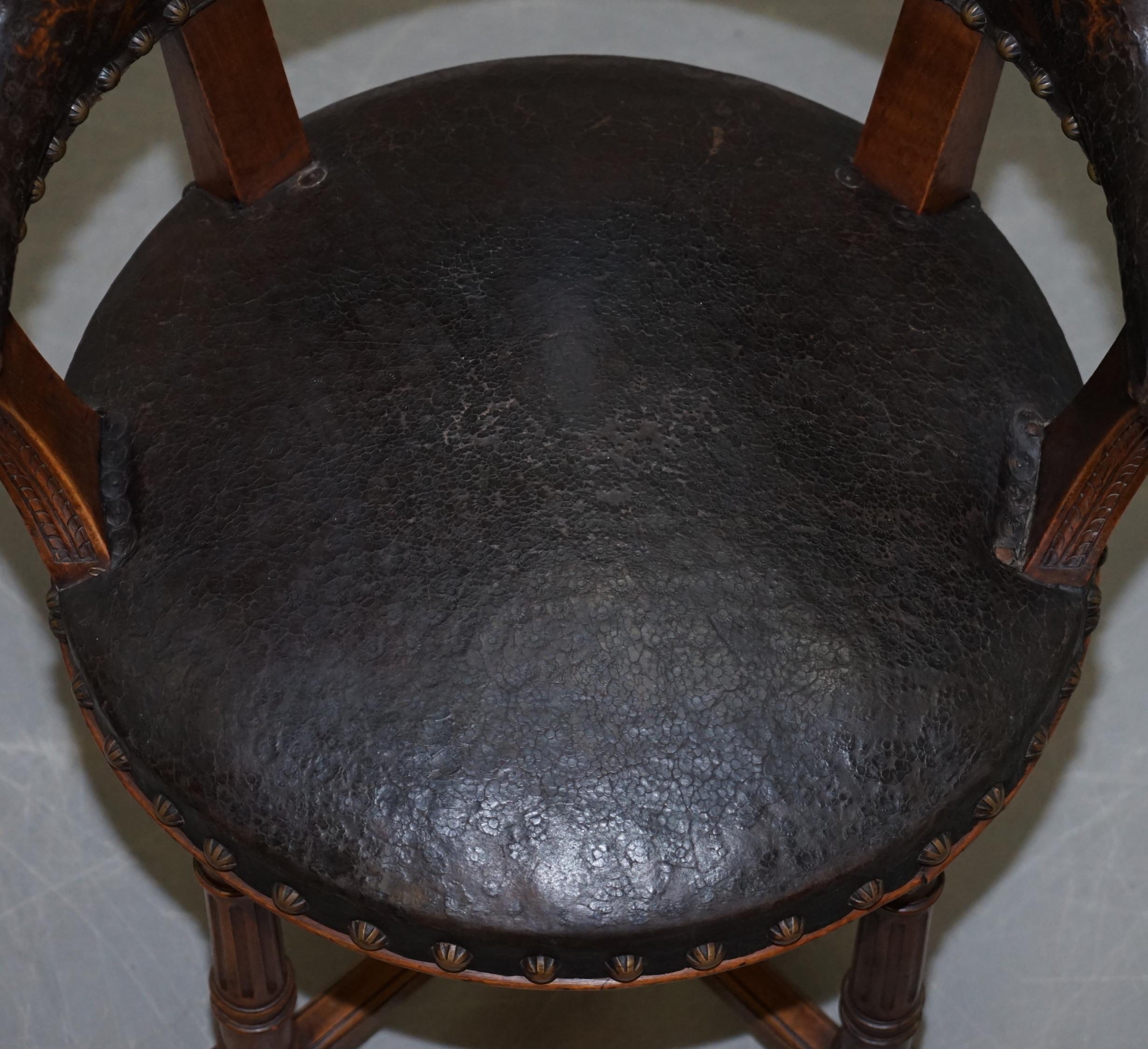 English Antique Captains Chair with Embossed Leather Armorial Coat of Arms, circa 1880