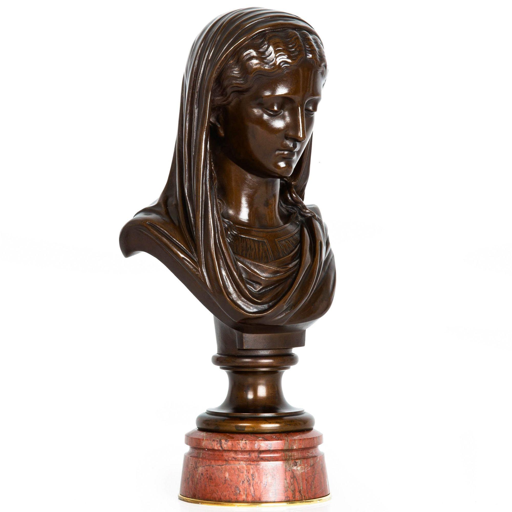 EUGENE AIZELIN
Français, 1821-1902

Buste de jeune femme (1864)

Bronze patiné reposant sur une base d'origine en marbre rouge tourné, avec un rebord en laiton.  signé sur l'épaule 