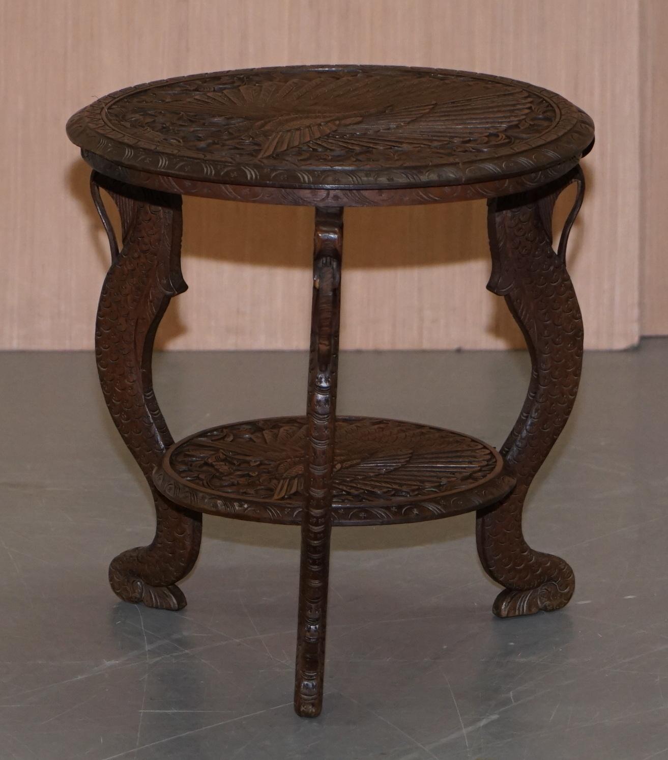 We are delighted to offer for sale this absolutely stunning original circa 1880 Burmese hand carved side table with lovely peacock design

A very good looking and ornate piece of art furniture, these were made as export pieces in the Victorian