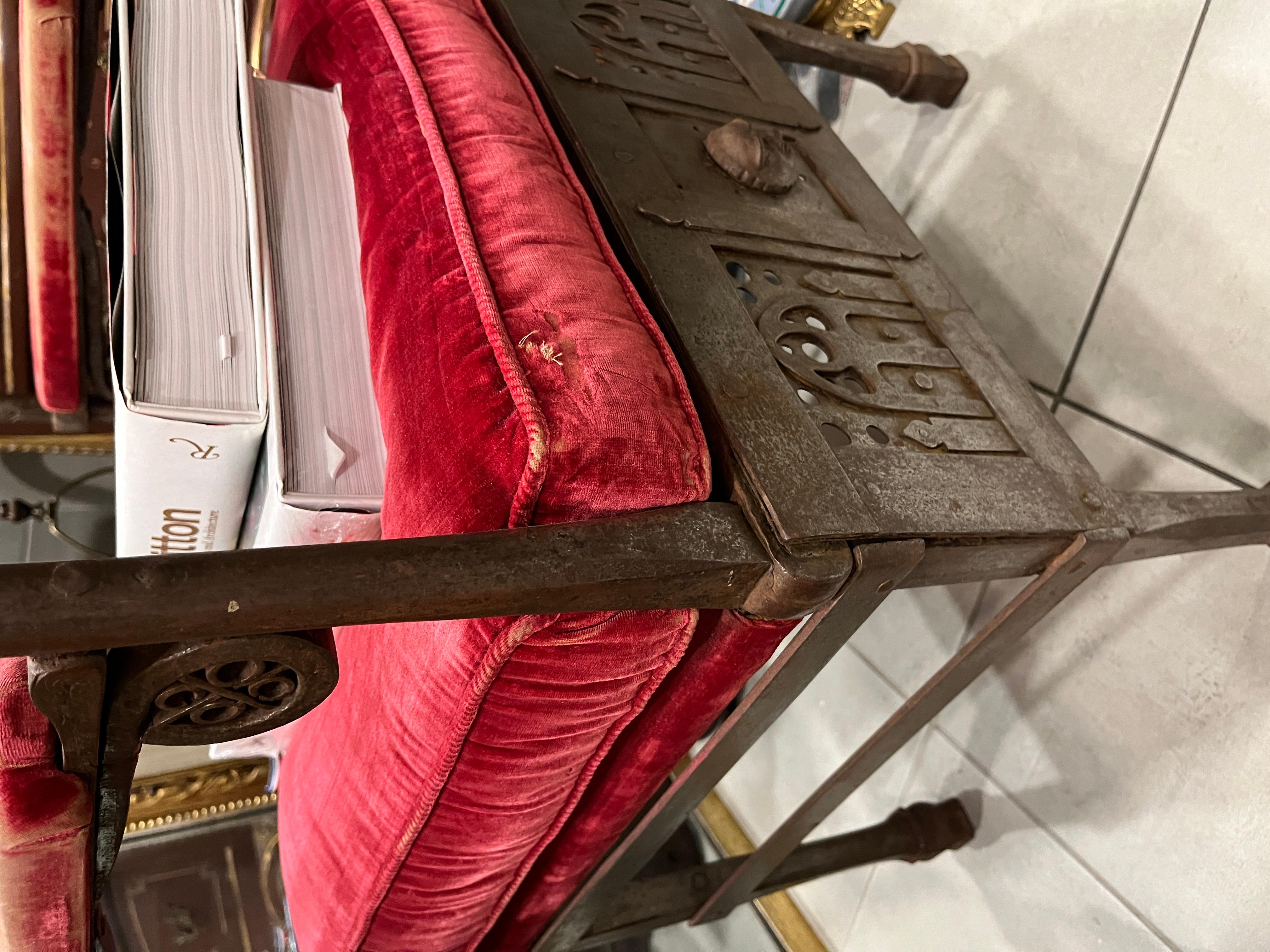 Circa 1880 Eastern European Gothic Wrought Iron Chair. Red Velvet upholstery and nicely patina on iron work. Heavy but handsome! please message us for more details.  See detailed pics below for condition and details.