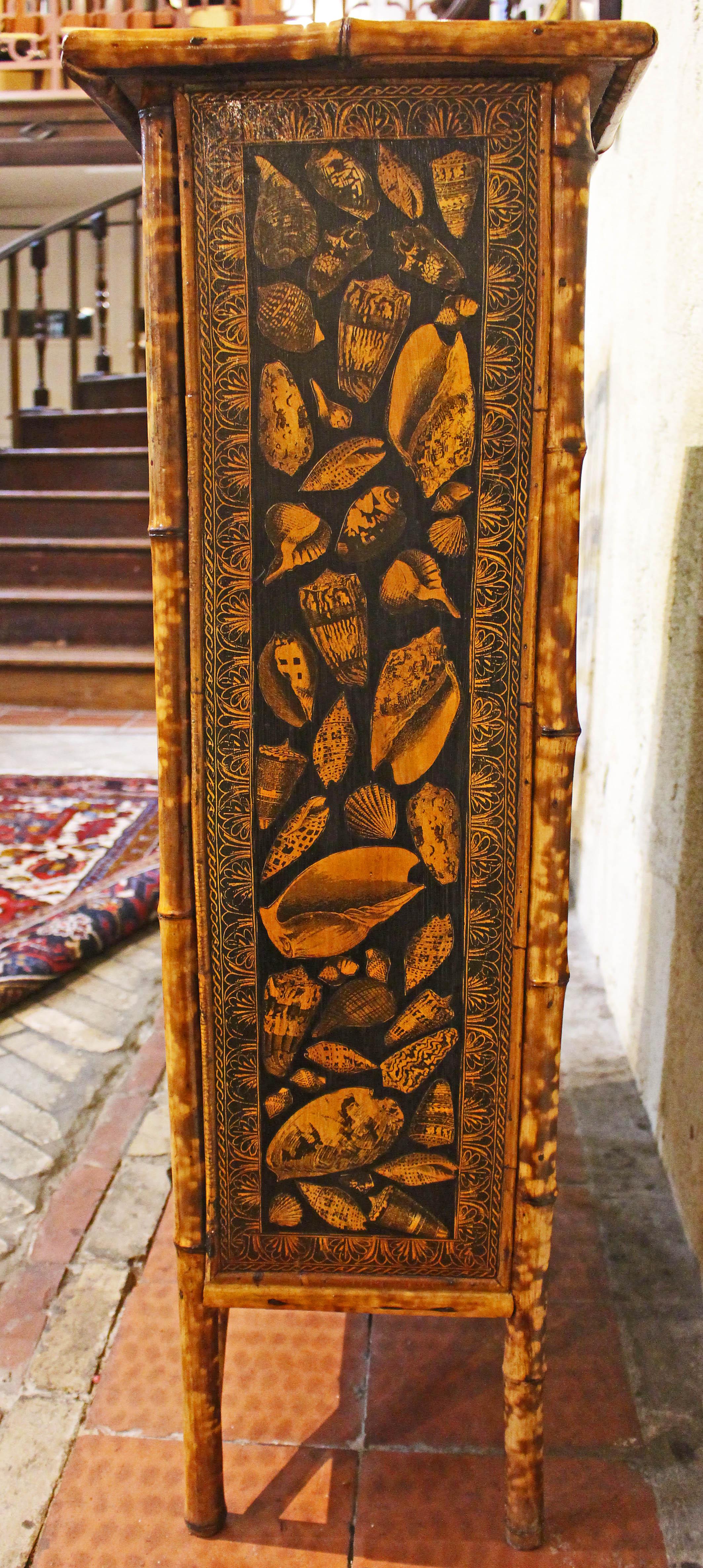 Victorian Circa 1880 English Bamboo Bookcase Now Artisan Decoupaged With Shells For Sale