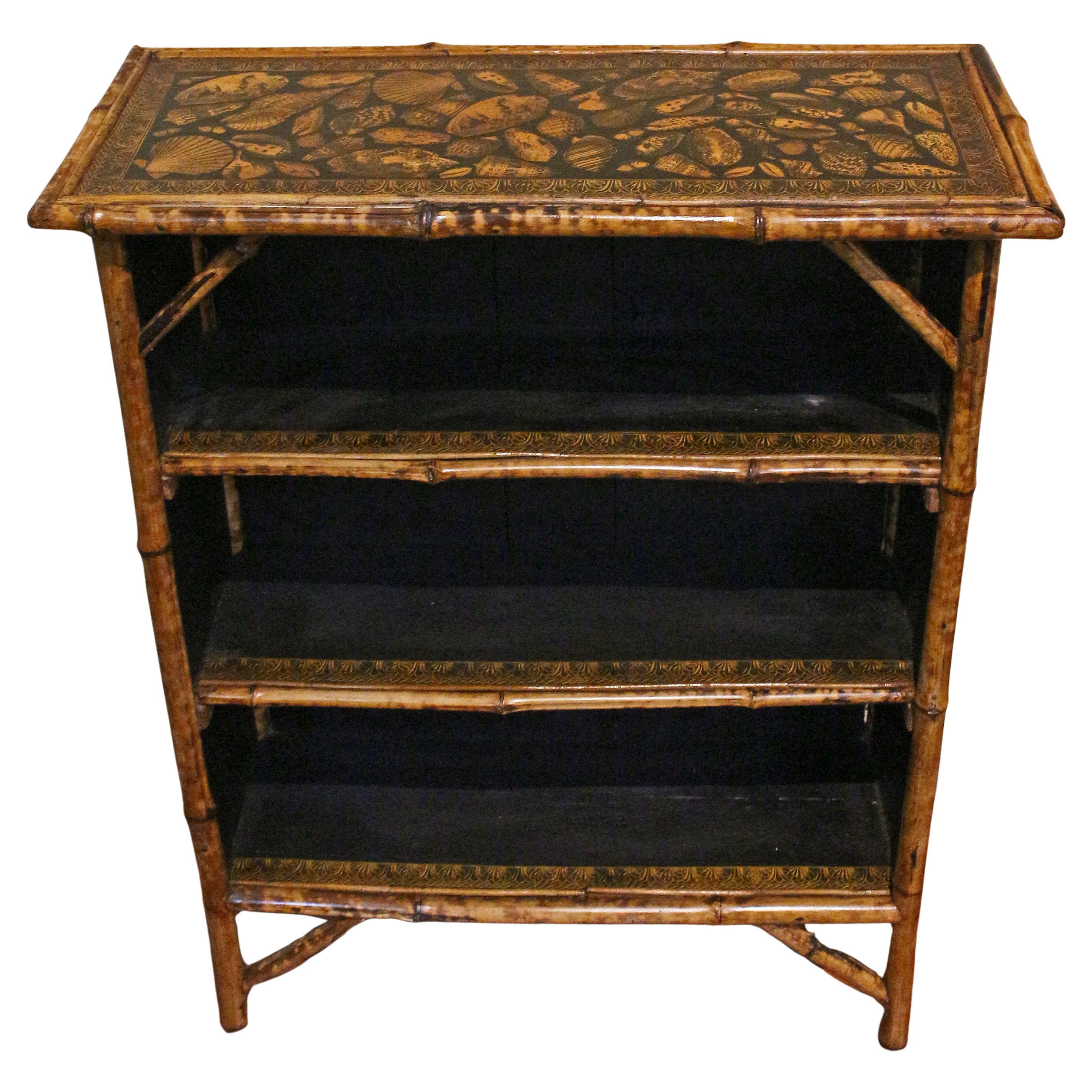 Circa 1880 English Bamboo Bookcase Now Artisan Decoupaged With Shells For Sale